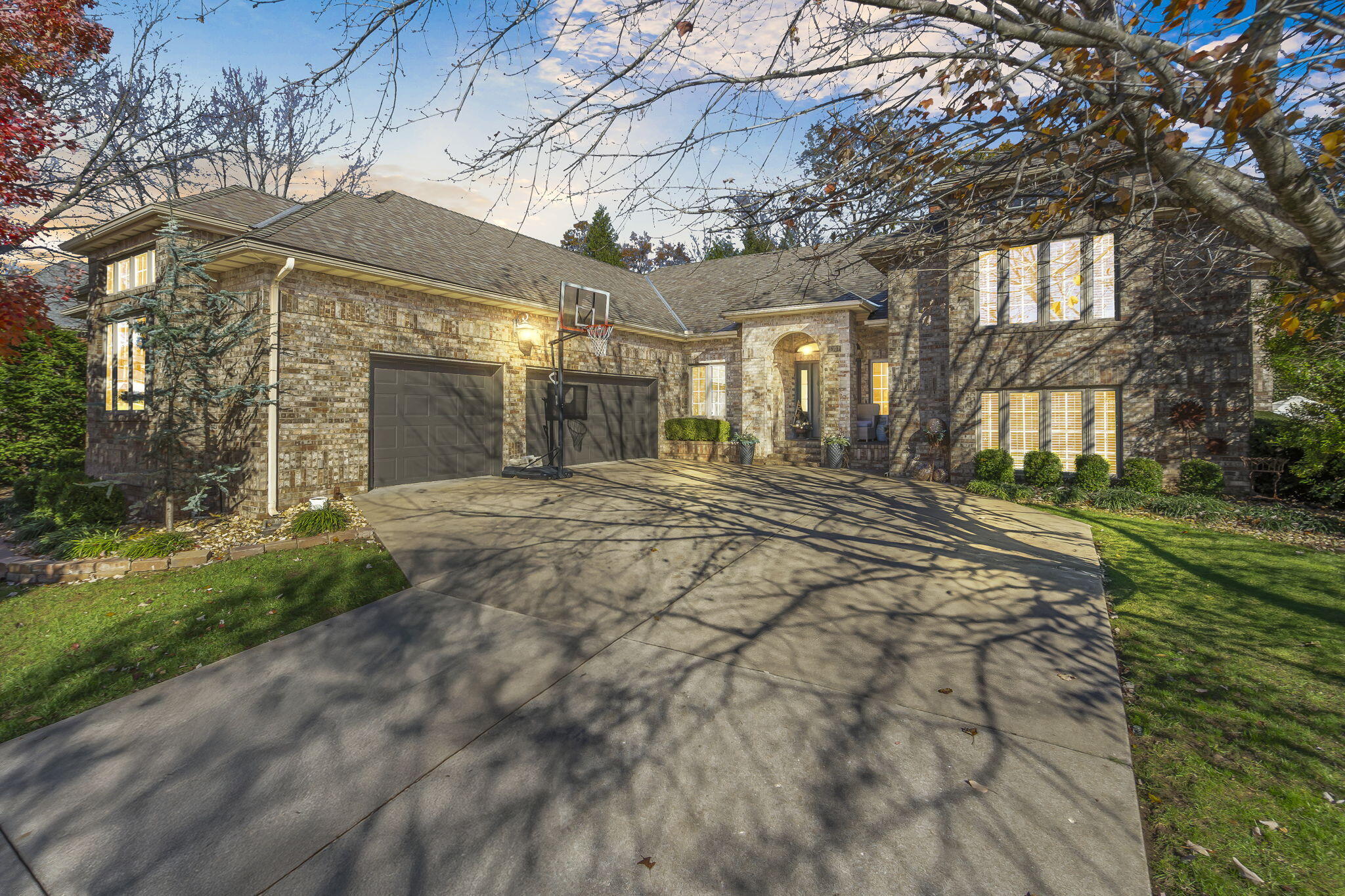 Experience unparalleled luxury and sophistication at this STUNNING home located in one of Nixa's highly desirable neighborhoods. This exquisite home is designed to impress, offering over-the-top elegance and thoughtful details throughout its spacious layout. As you step inside, you'll be greeted by soaring ceilings, expansive windows that flood the home with natural light, and high-end finishes that elevate every space. The NEWLY RENOVATED kitchen is a masterpiece, featuring custom cabinetry, top-of-the-line stainless steel appliances, a large center island, and luxurious countertops, making it perfect for entertaining or preparing gourmet meals. The primary suite is a private retreat, boasting a spa-like bathroom with a jetted tub, walk-in shower, and dual vanities, along with a massive walk-in closet. Additional bedrooms are generously sized, offering comfort and privacy for family or guests. Head outside to the beautifully landscaped yard that is an entertainer's paradise, complete with a LARGE patio and plenty of room for outdoor relaxation or recreation. Located in the sought-after Fremont Hills community and just moments from the Fremont Hills Golf Course, this property offers exclusivity, convenience, and a lifestyle of luxury. Call to schedule your showing today!