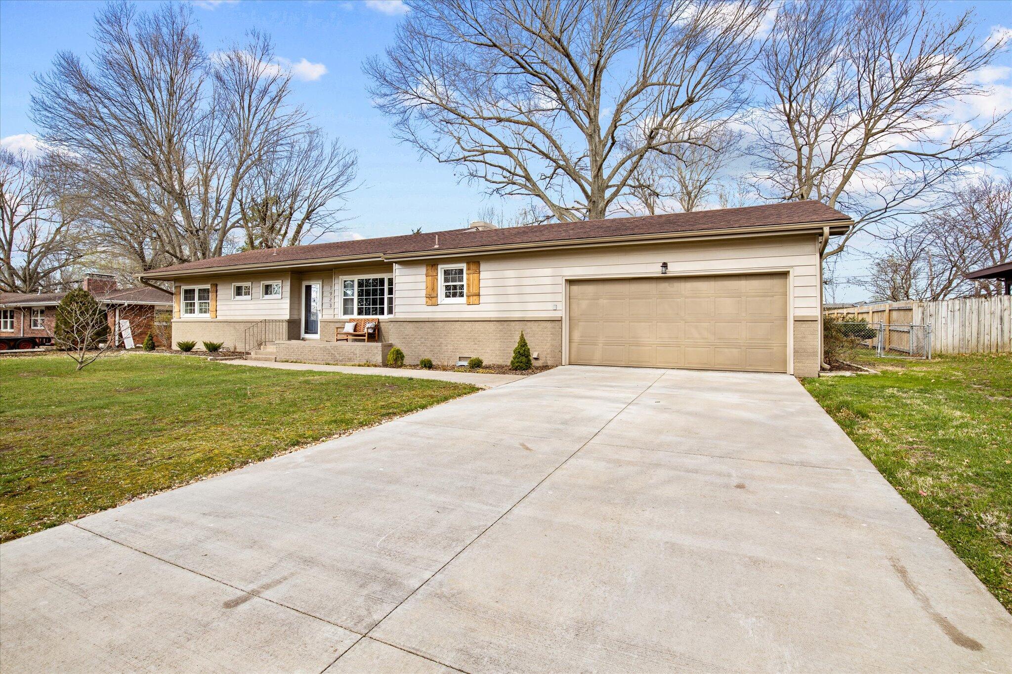 Welcome to 1923 S Saratoga Ave. This charming ranch has been tastefully recently redesigned. The main living space features an open concept kitchen with granite countertops, stainless steel appliances, a breakfast bar and dedicated dining space. The living room includes a patio view, electric fireplace, and wood shiplap accent wall. The bedrooms are arranged in a 3-1 split floor plan. The entirety of the home features vinyl plank flooring and modern light fixtures.  At 15,000 square feet, 1923 S Saratoga includes one of the largest lots Southern Hills has to offer. The backyard is fully fenced and includes a dedicated courtyard space, storage shed, and extended patio!