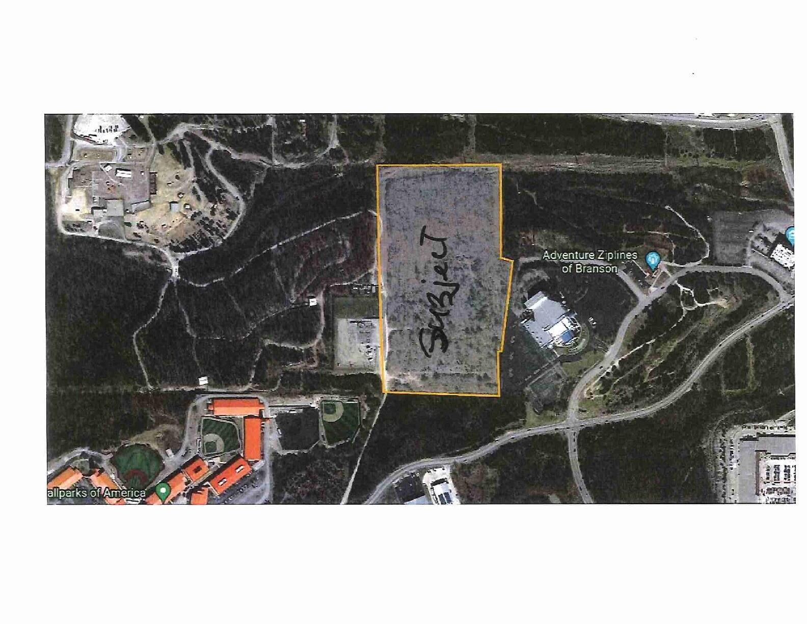 Reduced $50,000 for Fast Sale! Great Site in the Heart of Branson - Sewer - City Water - Options Galore!  Must see Property.  20.7 acres m/l. Great Location!