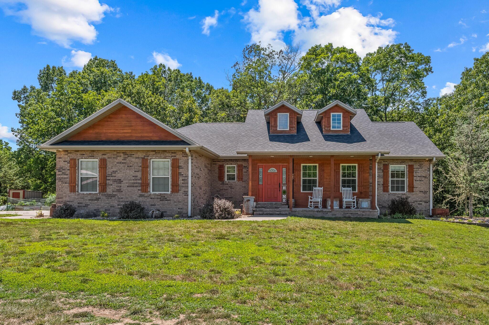 Tucked away at the end of Twelve Point Road you will find this beautiful home on nearly 11 acres with a shop. Enjoy the privacy and space provided by this property. You will immediately notice the great curb appeal of this walkout basement home. The living room is bright and inviting! Three bedrooms on the main level including the master. Head downstairs to find a spacious basement and two additional bedrooms. Outside you are surrounded by trees and the acreage is mostly cleared. The outbuilding is 24x40 and has electricity. Two tax parcels convey with this property. Bring your animals, plant a garden and enjoy this beautiful property!