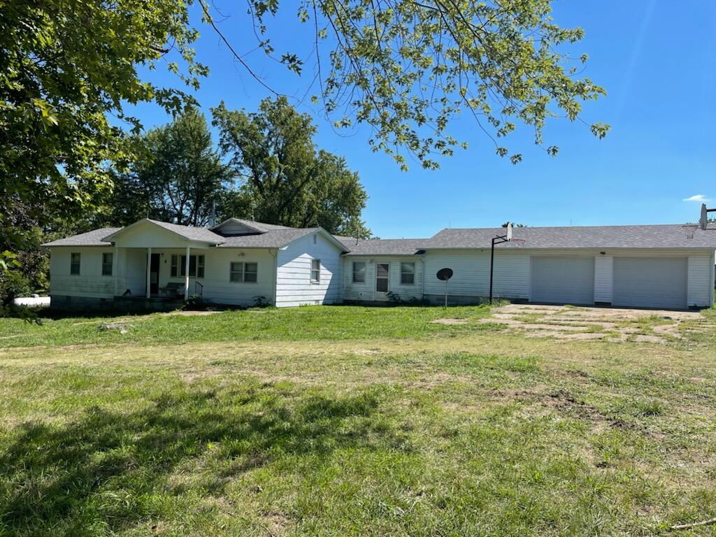 Ranch style home on a gorgeous rolling 280 acres (mol) down a long winding driveway with a well maintained 18X36 oval in ground pool. Approximately 1/2 open to use for hay or cattle and 1/2 wooded for plenty of privacy.  Numerous outbuildings including a 40'X48' insulated pole barn with concrete floor, 220V electric, an overhead door, a man entrance, an extended 24'x40' covered concrete apron and an 18'x72' attached lean to.Another 40'X60' pole barn with 20'x60' attached lean to. The property has 3 ponds and 2 all-weather creeks. Field includes 2 double automatic stock waterers, fed by dedicated 490' well.