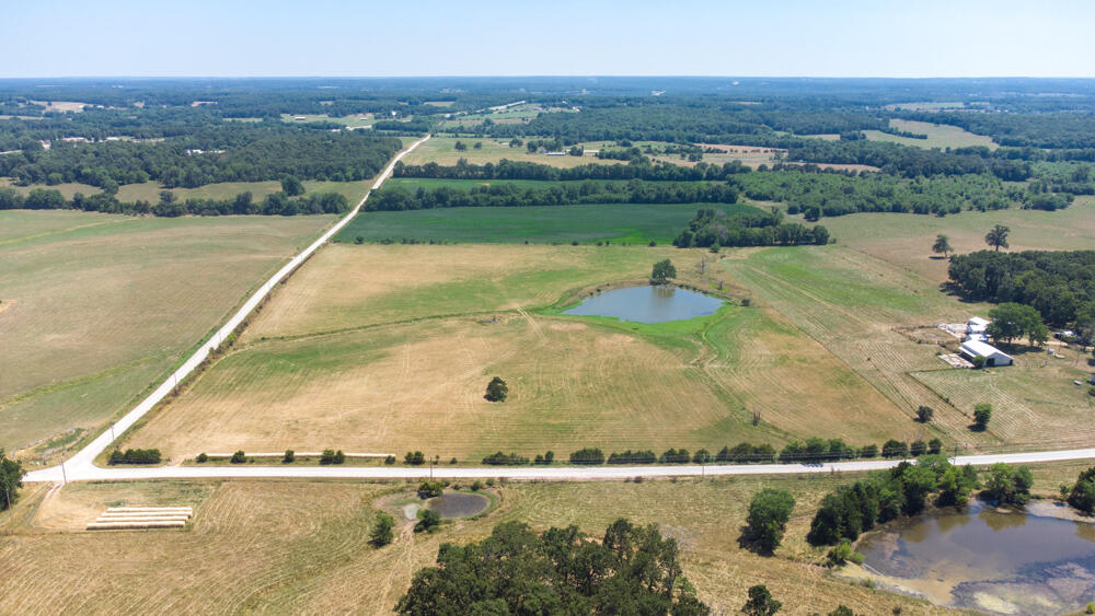 Looking for hay field or another pasture for your cattle? This is it! Fully fenced 27m/l beautiful acres with a Pond. Tin horn so you can always access on the other side of the wet weather creek that flows to the pond. Come make this nice field yours.