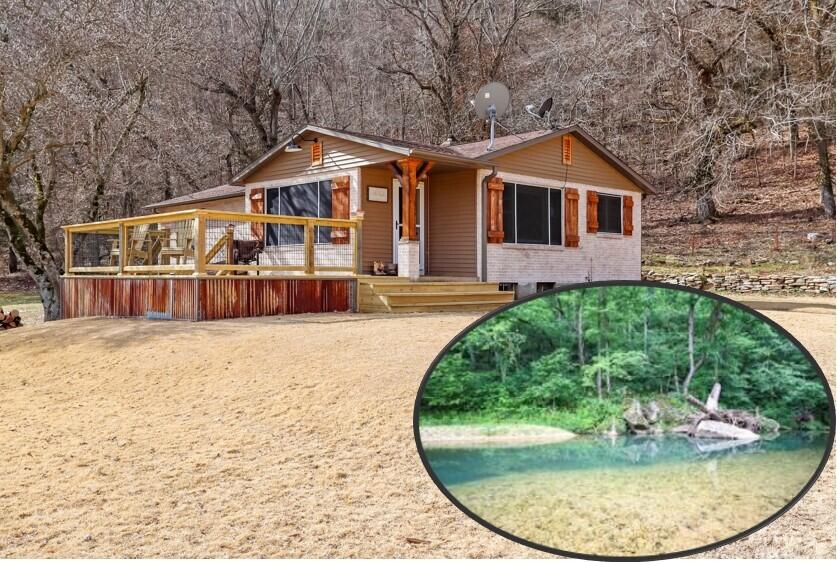 Self-Sufficient Prepper-ready, Century Farm in Off-the-Grid location with 3 Springs, Year-round Clifty Creek and Old Time Spring House with Amazing Spring.  Watercress grows only in cold spring water and this spring has more watercress than I've ever seen...it's something else!The Ranch is the ultimate working Cattle Farm and is perfect for living off the land and creating a homesteader's dream. The well-maintained land totals 400 Acres that is Fenced and Cross Fence and is set up for rotational grazing with 6 auto waterers. There is approximately 280 Acres of Lush pasture that will produce approximately 650 Round Bales of Hay. The remaining acreage is full of Marketable Timber. This farm comes with Complete Covered cattle working facilities, 3 Hay barns, Shop, and other Outbuildings, a Lake and an area with lots of Morel Mushrooms. The Newer Hay Barn is 30x80 with a 30x20 Lean-To and working pens. Cool Old Multi-Level Hay Barn, built around 1934, is 40x60 with basement, remodeled hinged doors, secure holding pens, concrete mid-walls and floor, and working squeeze chute with connected single file alley and holding pens. There are multiple Pipe-Fence corrals, alleyways and cross-sectioned holding pens. Another 30x60 Hay barn and Working Pen, a 30x80 Shop with Concrete Floor, Water and Electric and includes an Office and Parts Room with Heat and Air. The old rock house on the property could be converted to small animal breeding/holding facility. Main Home was built in 1958 - Cute, Cute, Cute - and is a true Farm Style Home - Updated with white washed brick and wooden shutters and beams. It has a nice entertaining deck and Koi Pond.  There is a Mobile Home on property with 3 bedrooms and 2 baths and would make an excellent Farm Hand house, Guest House, or In-Laws home. There are 3 wells on the property - one for the main Home, one for the 2nd Home and one for the waterers.