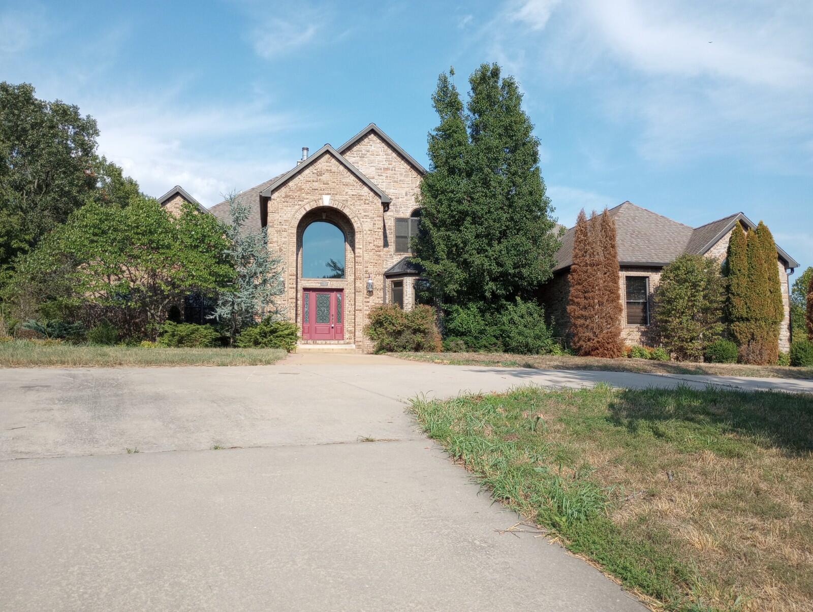 Massive 1.5 Story, 6 Bedroom, 7.5 Bath Home with a Basement sitting on 3 Plus acres located in a secluded setting. Too many features to mention all of them. Some of which include a spacious Kitchen with abundant cabinetry, Huge Master Bedroom suite complete with Fireplace, amazing Master Bathroom, and an enormous walk-in Closet. If you are a nature lover, you will enjoy looking at the wooded setting from the oversized Deck. The Large Patio by the Pool area is great for hosting friends and family for parties or other gatherings and activities. Home needs some TLC but provides so much potential and so many possibilities. Don't miss the opportunity!