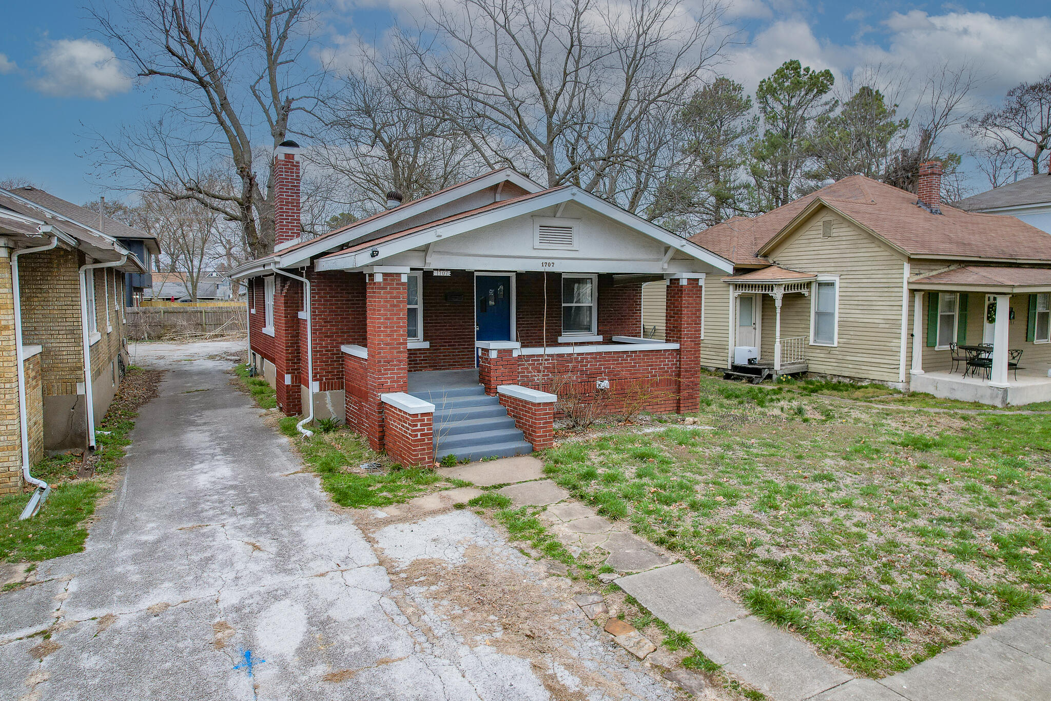 This remodeled 2-bedroom bungalow is move-in ready, featuring an adorable breakfast nook, a laundry room, and an extra-large living room with a fireplace. The house includes one bathroom and an unfinished basement. It is located near a park and within walking distance of the Historic Commercial Street District.