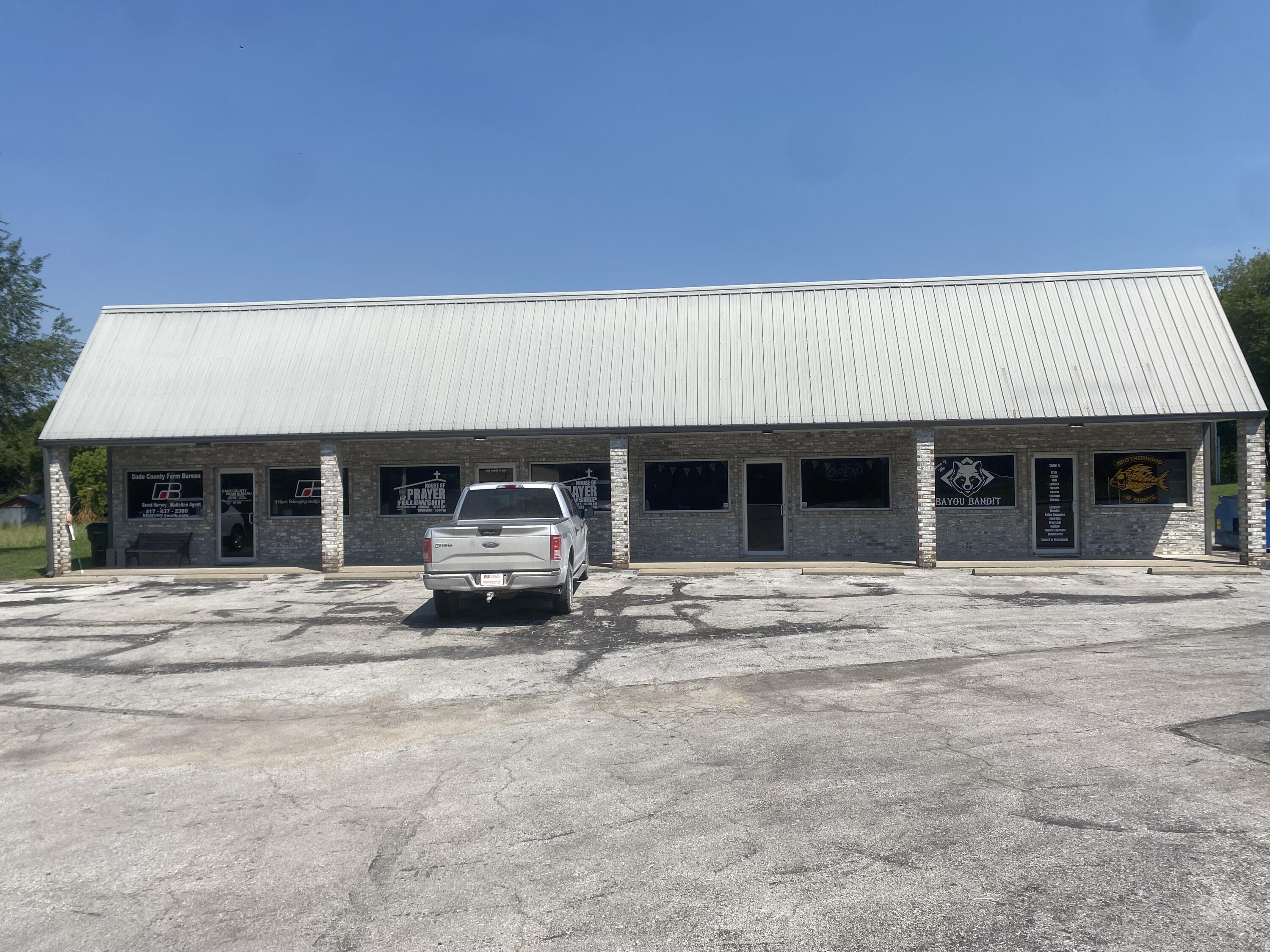 Great investment opportunity in Greenfield MO. Very nice 4 unit building with 2 of the units currently under lease. Clean property with great highway frontage! Lots of lake traffic and then hunting traffic in the fall/winter make this the perfect spot all year around. Turn the back area into storage spaces for even more income potential. Grab up this money maker property today!