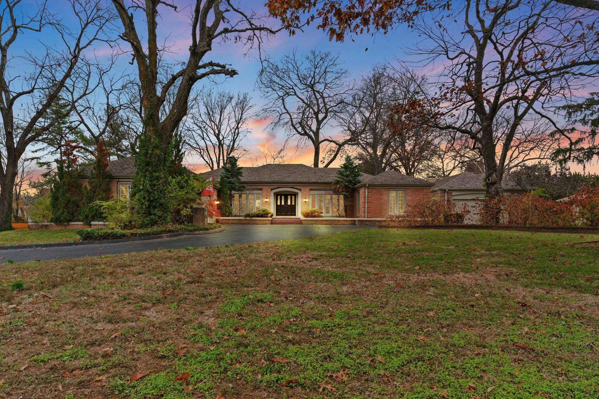 Coveted One-of-a-Kind Southern Hills Estate! This rare 1967 sprawling brick Mediterranean Style basement Home has been totally remodeled & updated since 1997-(only completed 4 years ago)-On Approx. one acre with Stucco Privacy fencing & huge wrought iron gates surrounding the back yard which separates this property from all of the rest! Magnificent outdoor entertaining includes in-ground pool, hot tub, pool house gazebo, NEW Guest House(bdrm/liv/kit/bath)2-car garage w/3 person sauna- Outdoor Kitchen- Charming gated European type walkway separating this from the main house, completely renovated through-out with elegant appointments( List of improvements in house and online; too numerous to mention here)- fabulous Kitchen w/GE Monogram S.S. Appliances, custom Cherry Cabinets(deep drawers),48'' cabinet depth Refrigerator/freezer, dbl. Convection Ovens, 5 Burner Gas Cooktop w/downdraft venting, triple S.S. sink, Coffee bar w/S.S. prep Sink, Wine Refrigerator, Cove Lighting. Living Room opens to backyard, Formal Dining, Hearth Room, Sunroom off Kitchen, Basement-( Family Room, Rec Room, Study/Den w/built-in Bunk Beds & storage rooms)- 6 Fireplaces- Amazing 23 x 13 Master Bedroom w/wood burning fireplace, door out to patio, bath w/heated Ceramic floors, Cherry Cabinetry, ADA Toto toilet- 2nd Bedroom converted to fabulous 18.8 x 11.8 main bathroom w/heated Travertine floors, walk-in shower w/pebbled heated floor, rain shower & spray, Absolute Black Granite, Bain ultra soaking/massage tub w/chromatherapy and drying cycle, Granite Ceiling fan- Gazebo Freking gas Grill- Gas Fireplace, Beer Tap, Sound System, Teak Bar, Industrial Hood, Granite, Coffeeville bricks on floor, Bricks are from old bus station, new roof Spring 2015-