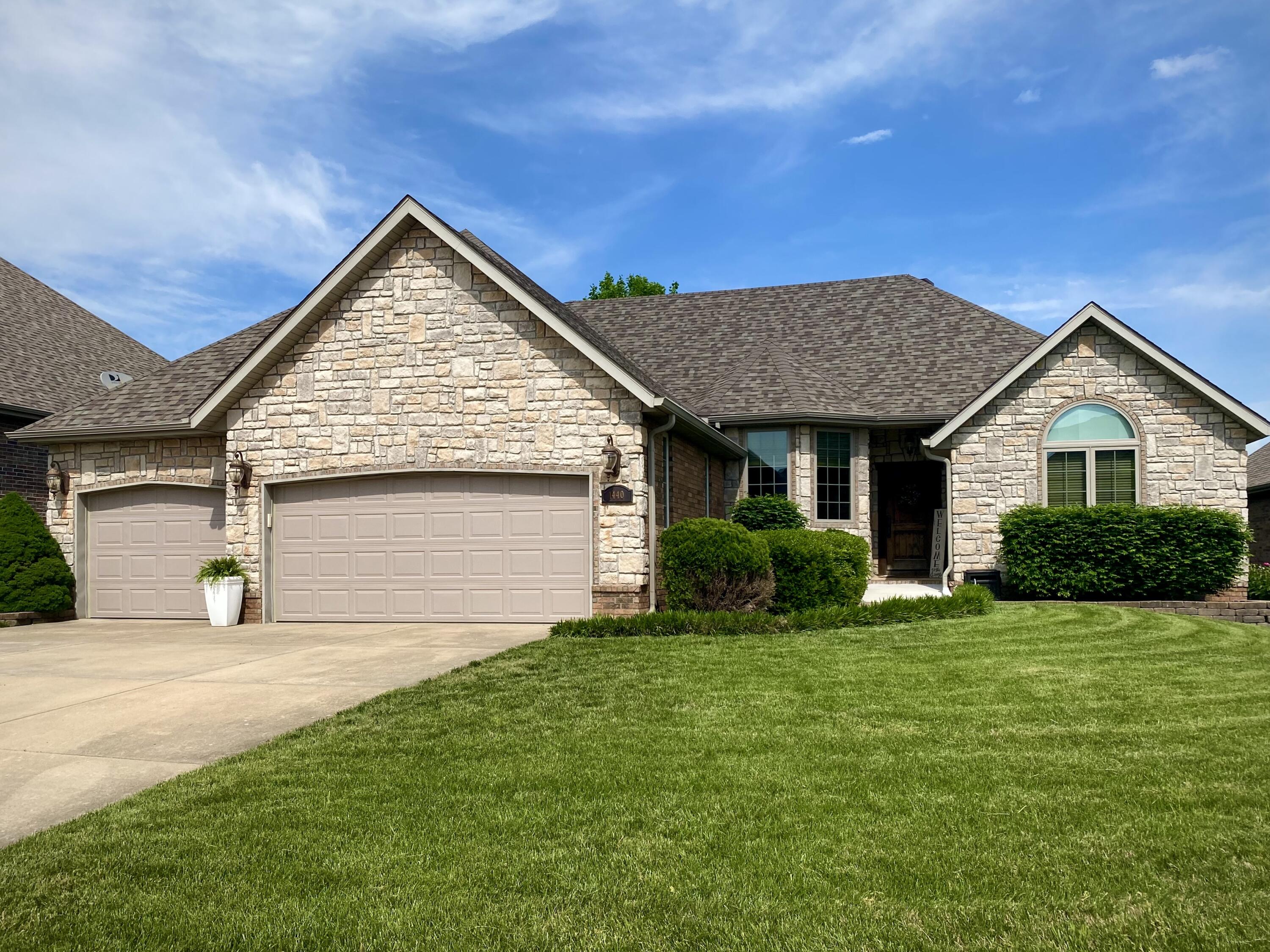 Beautiful one-level, all brick/stone home in coveted Lakes at Wild Horse subdivision.  With a new roof in 2020, new HVAC in 2021, new vapor barrier in 2022, newer front windows, and laminate wood flooring throughout, this is truly a low maintenance dream!  Imagine summer days enjoying the neighborhood amenities - two swimming pools, walking trails, fishing in the lakes, children's play area, basketball and tennis courts - and then returning home to enjoy a quiet evening relaxing on your large screened-in porch.  You can have it all with this well-maintained, turn key home.