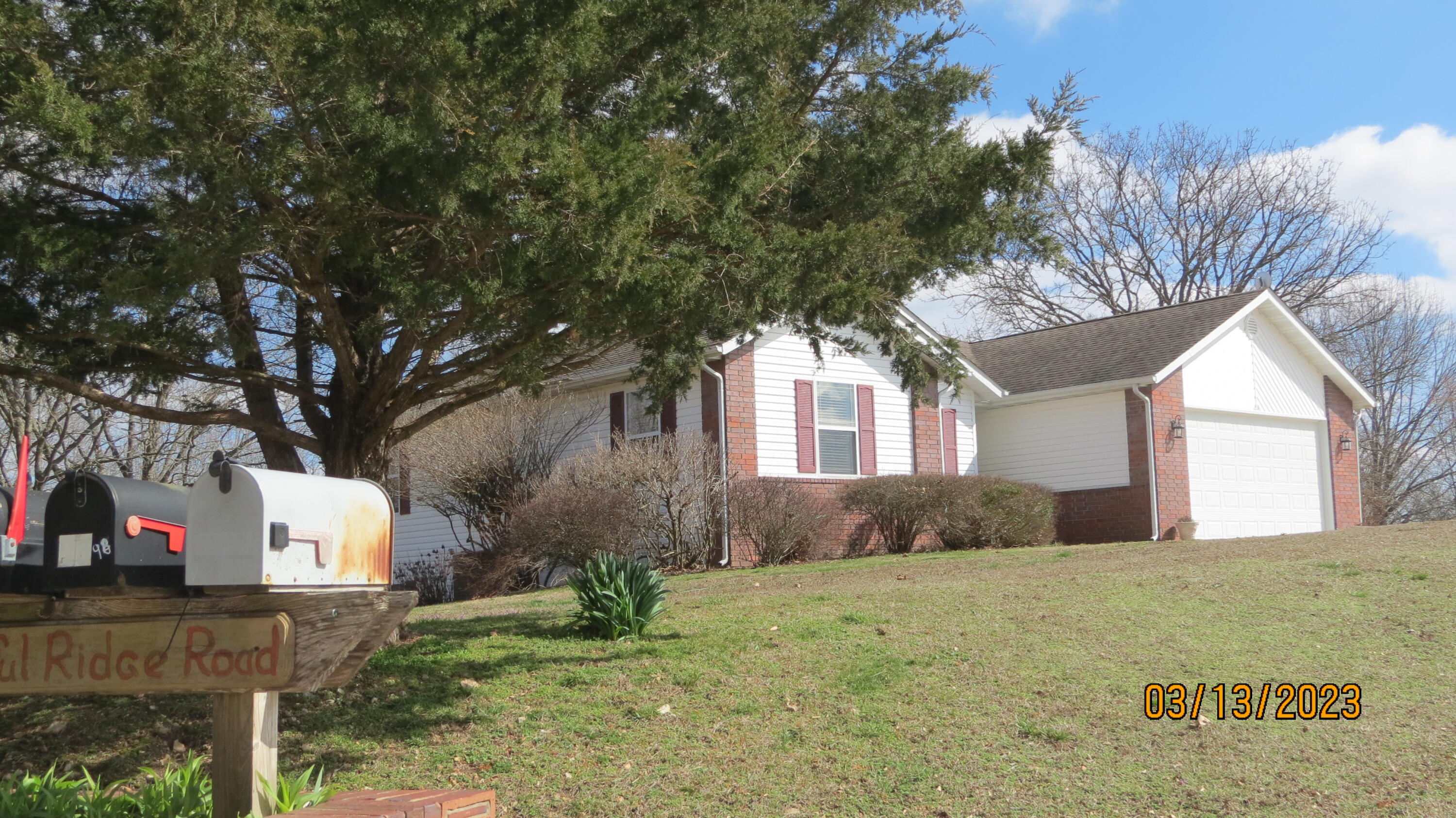 The name of the street says it best - Peaceful Ridge Road!  Just minutes from all the activities of the Lake, a half-hour from the bustle of the Branson attractions, and 45 minutes from Springfield shopping, dining, and medical resources is your slice of peace and tranquility.  Nestled on 3.5 acres of treed and sloping hillsides, it is perfect for privacy and outdoor enjoyment.  Be amazed at the wildlife, from deer to turkey, and various birds.  The attractive home has been well cared for, so you can move right in.  You will find 3000 square feet of finished space, with five bedrooms, or four plus office, den, or hobby.  You decide!  Rear walkout ensures plenty of light on both levels.  You will find a second living area on lower level with attractive gas fireplace to warm your family on cool evenings.  Or, step out from there to nature's beauty in typical Ozark style. Plenty of space for your special landscaping, gardening, etc.  Expansive deck gives you the choice of open air or covered area to enjoy independent of wet forecasts.  Home is perfect for large family, welcoming guests, or simply spreading out!  Ample storage will make organization easy.  Owners have enjoyed this property for many years, but medical situation is motivating them to meet their needs in another way.  The access ramp in the garage can be removed by owners if desired.  Here is your chance to live, love, and enjoy this peaceful setting.  Feel free to drive by, or schedule your time to check it out.  Don't miss out on this rare opportunity.