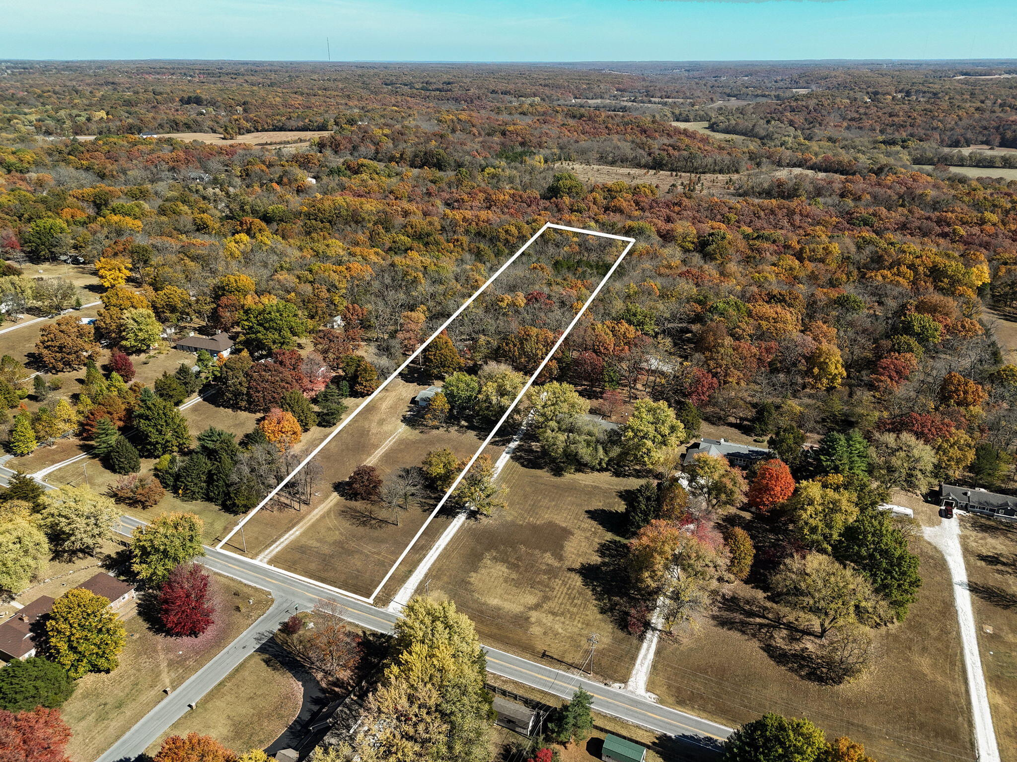 What an incredible opportunity to purchase 5 beautiful acres in an amazing location.  The acreage is a mixture of cleared and wooded with walking trails through the back.  This property has so many possibilities!  The 1400 square foot home has so much potential for someone looking to make it their own.  This one is a must see!
