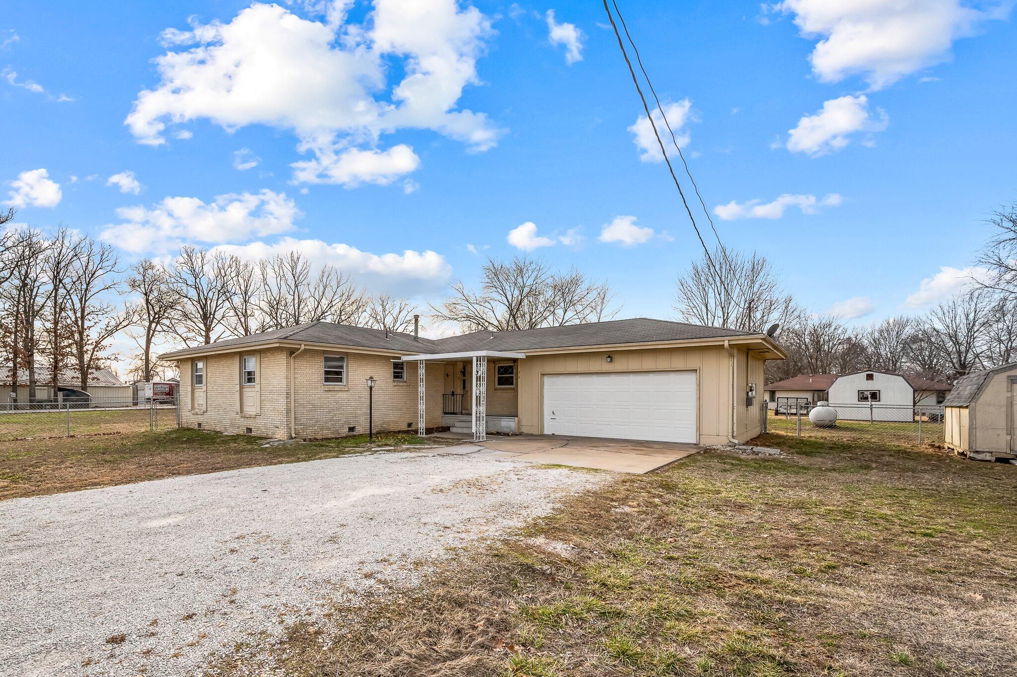 PRICE REDUCED!! Fixer Upper Opportunity with a very large lot in the heart of Rogersville!  Should be plenty of room to add a shop or even an addition. Grocery, restaurants, and retail just right out the front door.  Also very quick to get on HWY 60 to Springfield.  This mid-century ranch project might be the one for you!