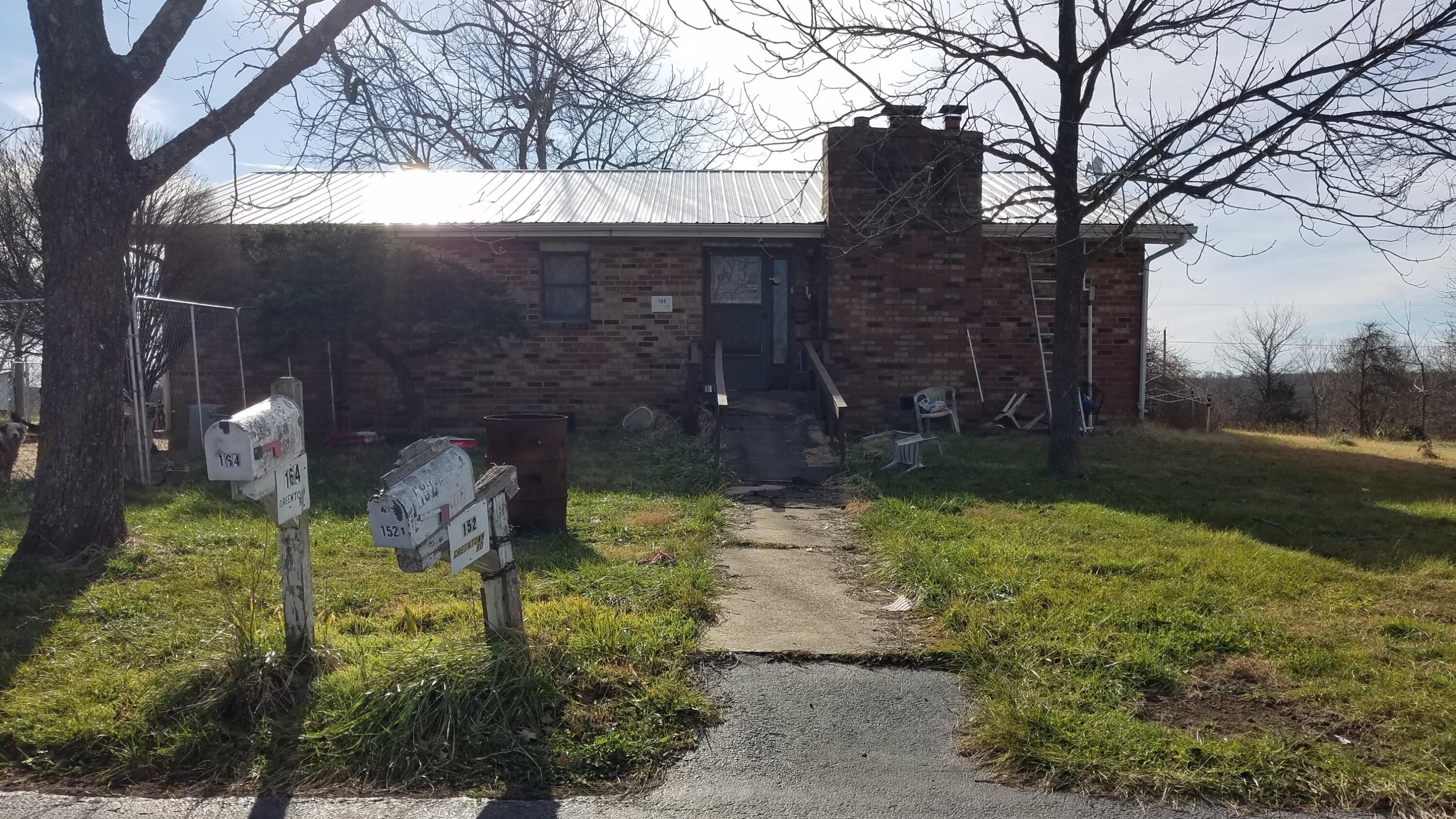 This is a nice 80 acres m/l conveniently located approx 3 miles from town. The land is gently rolling hills with 4 ponds and several springs. The property needs some TLC to bring it back to its best, however the potential is definitely here for the right person to to have a beautiful place. The two homes on the property need TLC but the land offers several barns and a big shop. Property is on a low traffic road. You could easily build where you could not see a neighbor.