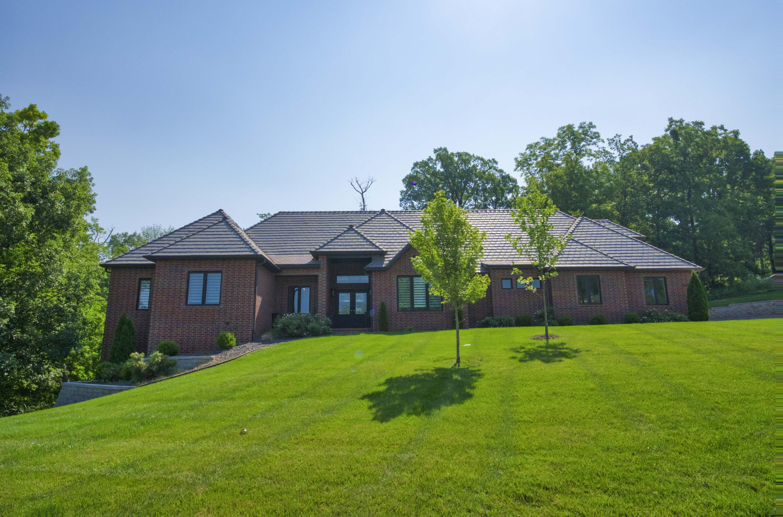 Welcome to your dream home! Located in Highland Springs. One of the most prestigious golfing communities in the Ozarks. This stunning custom built home is literally a piece of art. Contemporary architecture with a traditional balance. Built with the purpose of efficiency and strength using the most modern building techniques & materials. As you walk into this captivating home you will notice a perfect blend of luxury, comfort and spaciousness. With 5 bds, 4 1/2 ba and 3 possible living areas spread over 4600 sq ft of living space. Three of the four bedrooms are en suites. The open floor plan concept creates an inviting atmosphere ideal for entertaining guests or enjoying a quiet, relaxing evening. The heart of the home is the gourmet kitchen with a complete top of the line appliance package that incudes Jenn-Aire appliances & pot filler. Custom cabinetry with under cabinet lighting & lit glass cabinets is abundant and with tons of counter top space not to mention a large center island & a walk-in pantry. Spacious living room with contemporary fireplace and lit, custom built-in bookshelves. Formal dining room with glass doors off the entry. Retreat to a large primary suite and unwind in this spa-like atmosphere with a huge walk in shower, double vanity and a soaking tub. Backlit mirrors have been installed to create perfect lighting. A large laundry room with extra cabinetry is a bonus. All bathrooms and laundry have heated floors. Note the mechanical area and extra storage hidden behind the bookcase in the basement. Oversized 3 car garage provides plenty of room for vehicles, golf cart or just storage. A large covered deck is constructed of composite flooring & railing. Other notable upgrades include a Da Vinci roof with a lifetime warranty, spray foam insulation has been blown from end to end & all railings in the home are produced locally by 2 Rivers Forge. Schedule a showing today and discover the unparalleled luxury, elegance and comfort of this beautiful home.