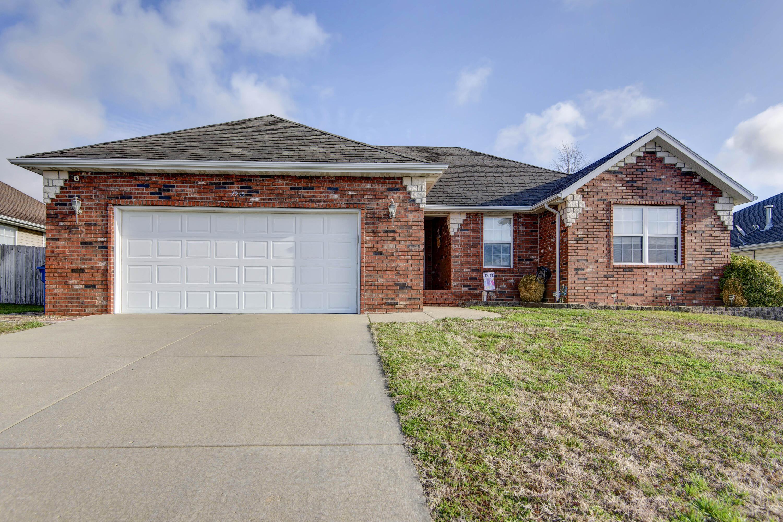This beautiful 3 bedroom, 2 bathroom, 2 car garage is located in the quiet Rolling Hills subdivision in Ozark! Walk into the front door and you'll immediately notice the openness of the living room and kitchen. The flooring has been replaced to new high-end vinyl plank in 2020. All of the bedrooms were newly carpeted in 2021. The master bedroom is huge and the primary bathroom has two sinks, jetted tub, walk-in shower and his and hers closets! This home features a split bedroom floor plan as well. New furnace just a few months ago. New stove, sink and microwave. Dishwasher is 4 years old. The backyard is fully fenced and features an added deck, perfect for sitting outside and entertaining. There is also a firepit to roast marshmellows!