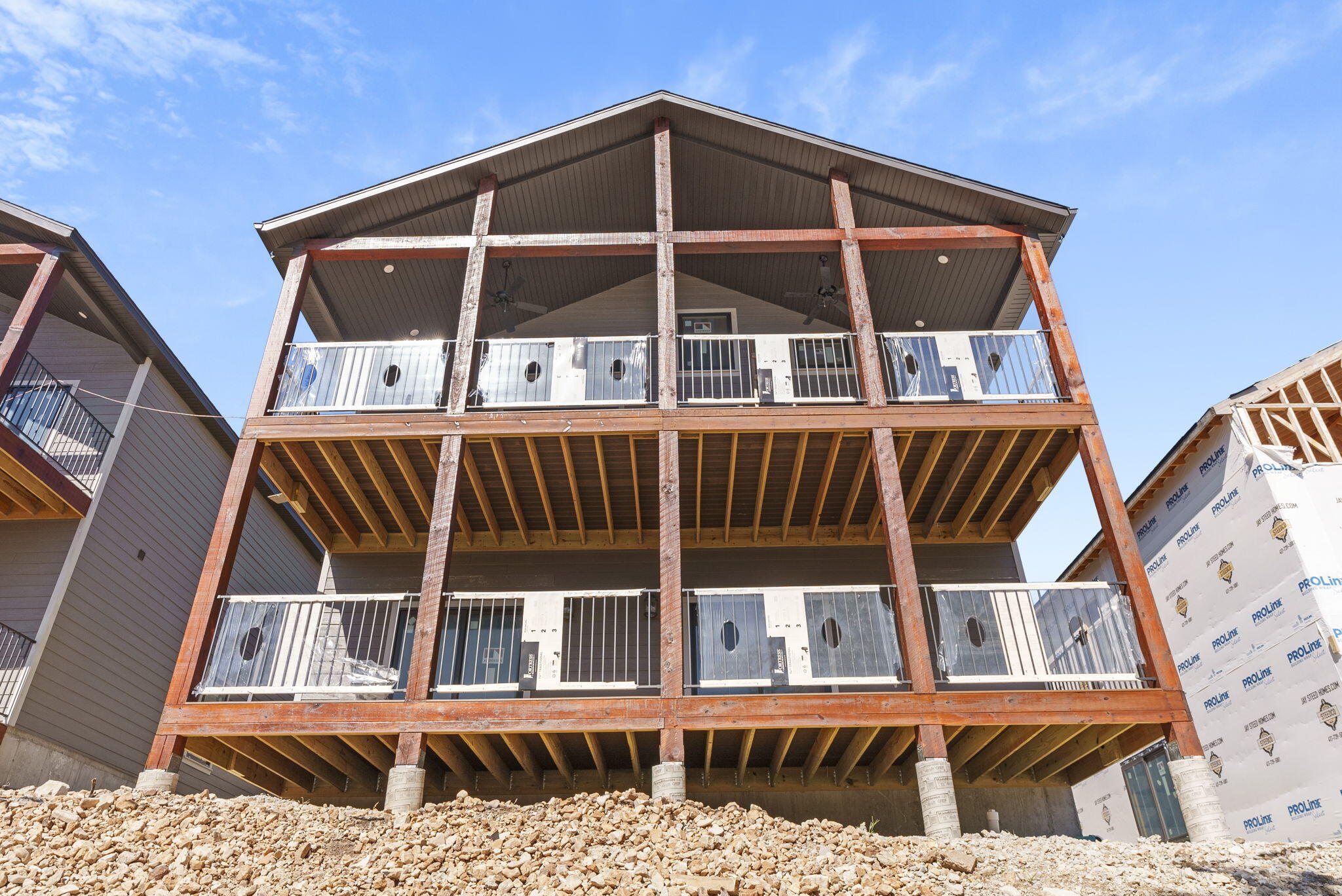 Brand New Construction on Indian Point! You will not want to miss the opportunity to own a Lodge in a Lake Front Resort that has everything you have been looking for! Pools, Boat Slips, Kayaks, Paddle Boards, and much more! The Lodges at Jax Creek sit in a nice Cove on Indian Point just seconds from the Marina, Night-Life, and some of the locals favorite restaurants. These lodges are vacation rental approved and have garages! There is a 3rd Part Boat Slip is available through Indian Point Marina with the buyer's option of keeping the lease .