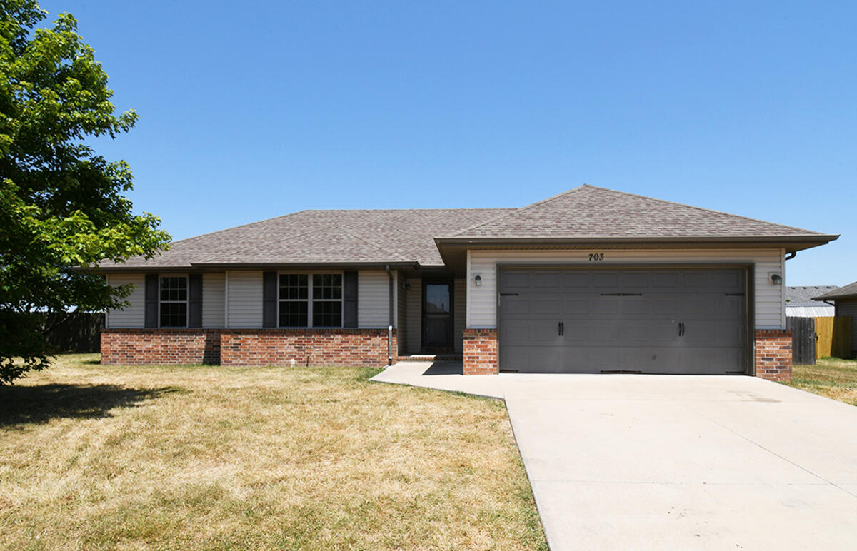 A WINNER FROM THE CURB!!!   This home sits in one of Clever's most desired neighborhoods. It features 3 bedrooms (all   have walk-in closets) with the master having two. Remote light/ fan switches in master and living room. 2 full baths, and 2 car garage.  This home is priced to sell. Won't last. Seller is leaving an 'almost new, large refrigerator in kitchen too.