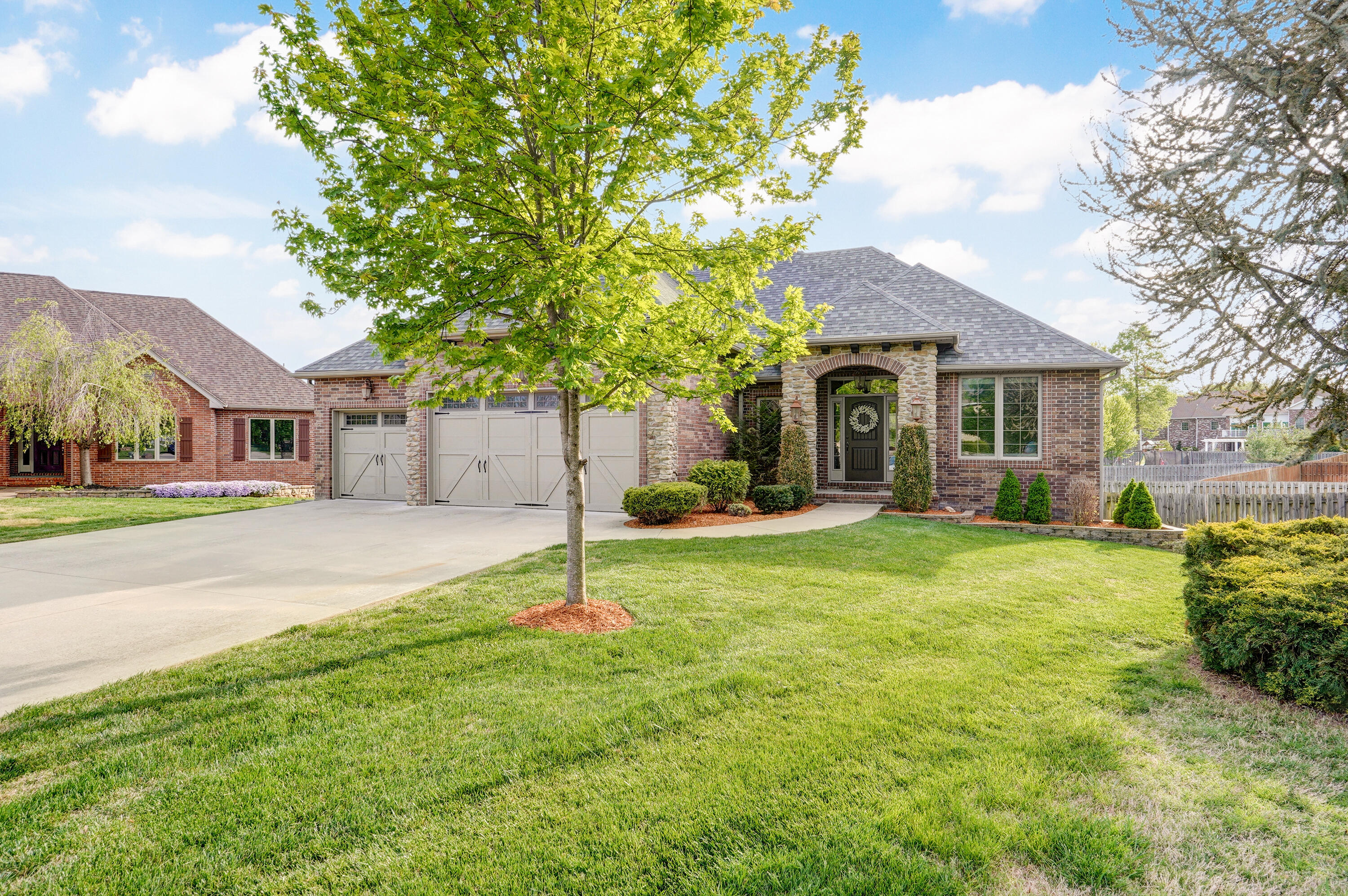 Open House-Sunday April 30  2:00-4:00PMLOCATION! LOCATION! LOCATION!   This beautiful home is located in the heart of the Olde Ivy Subdivision.  The open concept floor plan features 5 bedrooms, 3 full baths and is situated on the perfect cul-de-sac in this amazing neighborhood.   Love to entertain?  There's plenty of room for that with three separate living areas!  The main attraction is the having the upstairs living area open to the kitchen area with a large bar separating the two so that you can be part of the party while you preparing amazing meals!  The kitchen has beautiful white glazed custom cabinets with granite countertops with under cabinet lighting, large walk in pantry, stainless appliances and a gas stove.  Hand scraped hardwoods and a gas fireplace with a beautiful mantle round out this amazing area.  There are two living areas located downstairs.  One with a wet bar that even has a dishwasher for easy cleanup!  A covered 12 X 20 deck upstairs and a covered 12 X 20 patio off the downstairs family room. The upstairs main bedroom has a tray ceiling with indirect lighting and crown molding.  The ensuite has a large walk in tiled shower, a 6' soaker tub, and a walk in closet.Love the thought of having your own home gym?  This house has one complete with a rubber floor and double doors to bring the outside if you want!  Additional features- Roof replaced July 2022.  Storm shelter.  Mudroom with hooks for coats/backpacks and plenty of space for shoes. Large back yard with a privacy fence.  Irrigation system in the front and back yard.  Only a few houses away from the neighborhood pool.  Call for your private showing today!