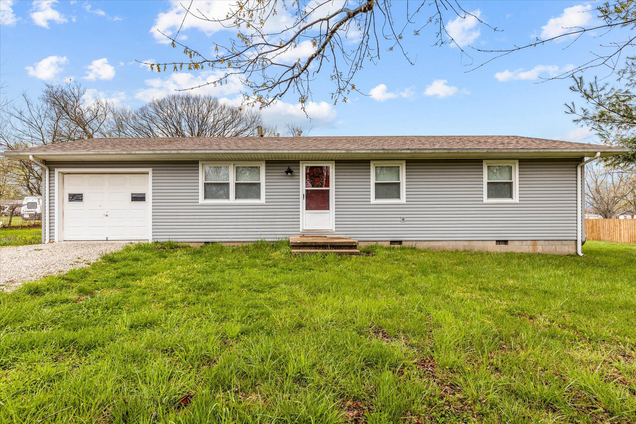 You won't want to miss this 3 bedroom, 1 bathroom home in Wheatland! The home is up to date with laminate flooring throughout the house, a tiled bathroom and a cute kitchen backsplash. In this home, you will also find a 1 car attached garage and a small storage shed outside, all nestled on an oversized lot!