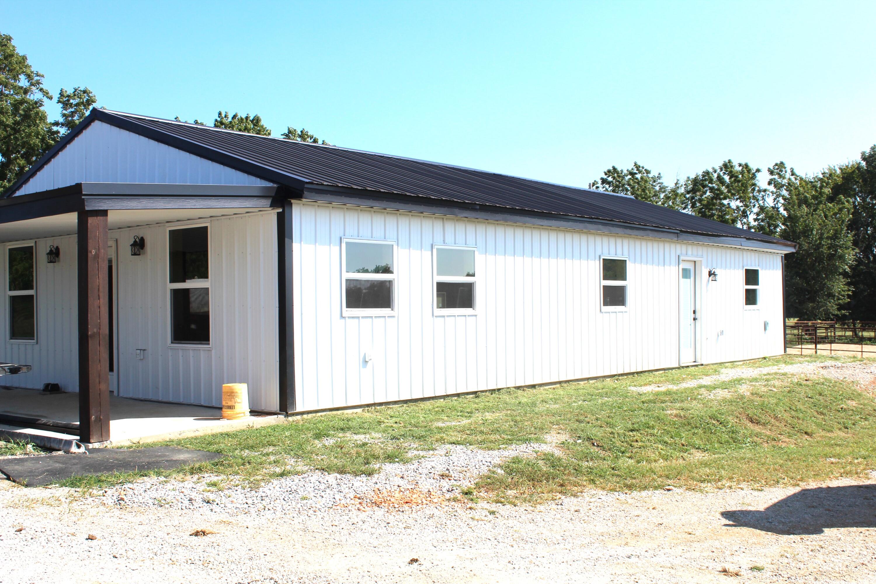 Beautiful rolling 85-acre farm featuring a newly built 2-bedroom 2 bath Maintenance free farmhouse. A large 45' x 75' horse barn with horse pens and a cozy 1 bedroom 1 bathroom living quarters inside the barn. There is also a horse arena and corrals. The family owns 4 more adjoining parcels of lush pasture and it's all being sold together for the listed price, owners will not break it up. Pastures are fenced, cross fenced and gated. There are 2 ponds and automatic cattle waters. Call today for your appointment.
