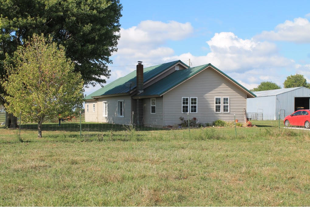 If you are looking for a great country property located just a short drive from Stockton Lake and 30 minutes from Springfield, then check outthis 120-acre Polk County cattle farm. A beautiful 3-bedroom, 1-bath home with a 30x70 shop has a panoramic view of this great property that producesexquisite sunsets. The land has 2 ponds and is mostly open acreage that is ready for livestock. You will also find this property to have plenty of space forrecreation such as hunting, horseback riding, or taking an ATV ride. This beautiful 3-bedroom home has hardwood flooring along with gorgeous wood on the living room walls. This home has a great dining room and kitchen area featuring an island.  More details can be provided by contacting the listing agent.