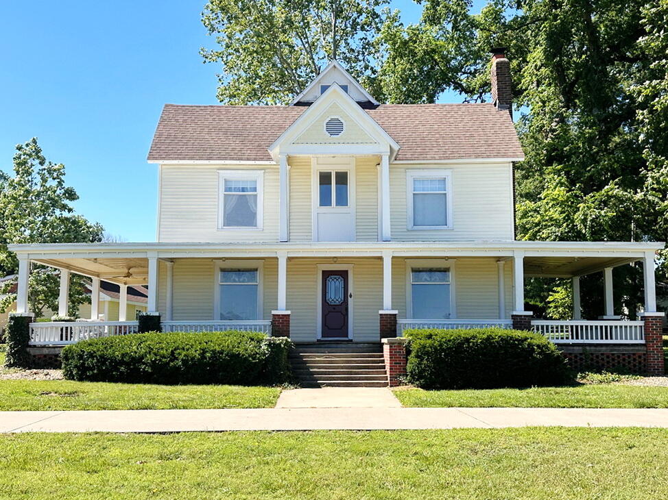 Charming Modern Farmhouse on 24 Acres for Sale, Vernon County, MOIdeal Location. Classic Charm. Modern Conveniences. Artistic Style. All on 24 Peaceful Acres just south of Nevada, Missouri.  This updated farmhouse is a high-end must see. Featuring over 2200 sq feet of living space, this 3-bedroom, 3-bathroom home boasts large rooms, natural lighting, beautiful custom finishes, and functional charm. Classy stained-glass windows, paneled wood ceilings, stately beams, and graceful arches are just a few of the artistic touches that make this home special. The home features 2 fireplaces, the living room's fireplace boasts a handsome marble hearth. The master suite features a stately loft, tiled jacuzzi tub, large walk-in closet, and stunning floor to ceiling windows that can be shaded by motorized blinds.  Access to the home is easy but secluded; from the paved road travel up the long, paved driveway to the oversized paved parking area and circular drive.  As a bonus to the property, a guest home provides additional living space, office space, or even potential for vacation rental income.  The guest home features almost 600 finished sq ft including one bedroom, one bathroom, a kitchenette, and a living room. The guest home also includes a four-car garage with additional garage storage space. The property around the home is mostly pasture with some mixed timber.  The location is near, but outside, the city limits of Nevada, MO, allowing easy access to shopping, restaurants, and healthcare. Classic County Homes on Small Acreage are difficult to find. Call today to schedule a private tour of this amazing property.