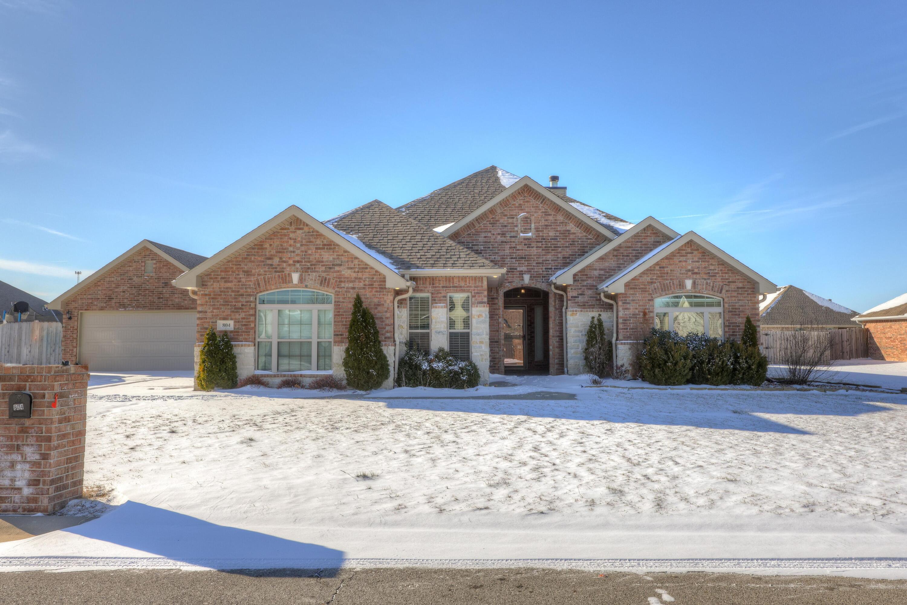 Start the new year in a beautiful new home! Located in the lovely Briarbrook community, this full brick 4 bedroom, 3 bath home has access to amenities such a golf course, pool, and nearby walking/biking trails. You will have lots of extra space inside and out, including an oversized lot with privacy fenced back yard and four garage spaces. The 2 car detached garage/workshop would be perfect for storage or hobbies! Entertain your guests with the wide open floor plan, spacious rooms, and a covered patio. High-end touches featuring granite counters throughout and stainless steel appliances make this a gorgeous home that you'll love coming home to every single day. Call today for a personal tour!
