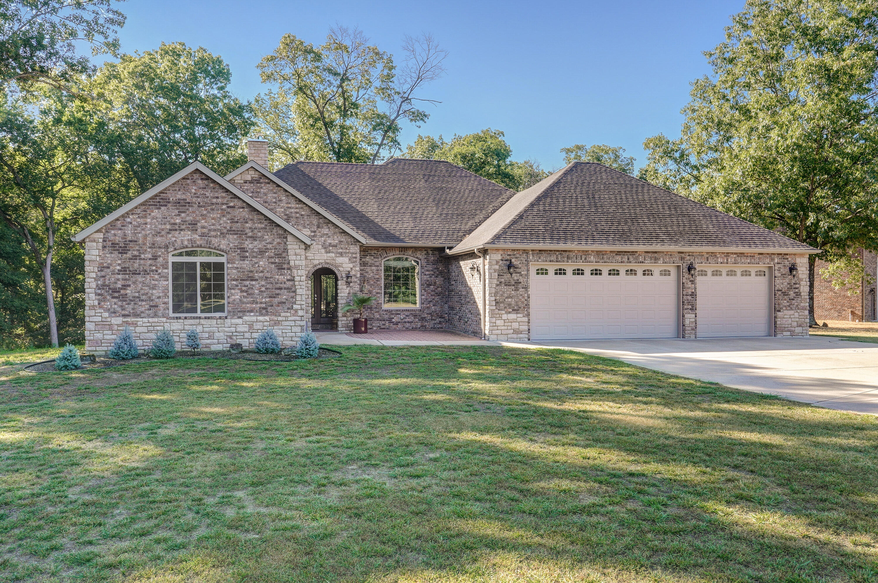 Here is a phenomenal 4 bedroom, 2 bathroom home sitting on 3+ acres with a large 60' X 80' shop with over 4,800 square feet that can hold 20+ cars. A toy lovers dream! The exterior of the home is all brick, features a back deck and patio that is perfect for spending downtime with family or entertaining guests. Inside the home features include multiple dining areas, tray ceilings, tastefully light colored walls, large rooms with an open floor plan, a gorgeous stone fireplace, and an exquisite kitchen with recess lighting, beautiful wood cabinets, stainless steel appliances and an island bar. Call today to schedule your showing! You won't want to miss this one of a kind property!