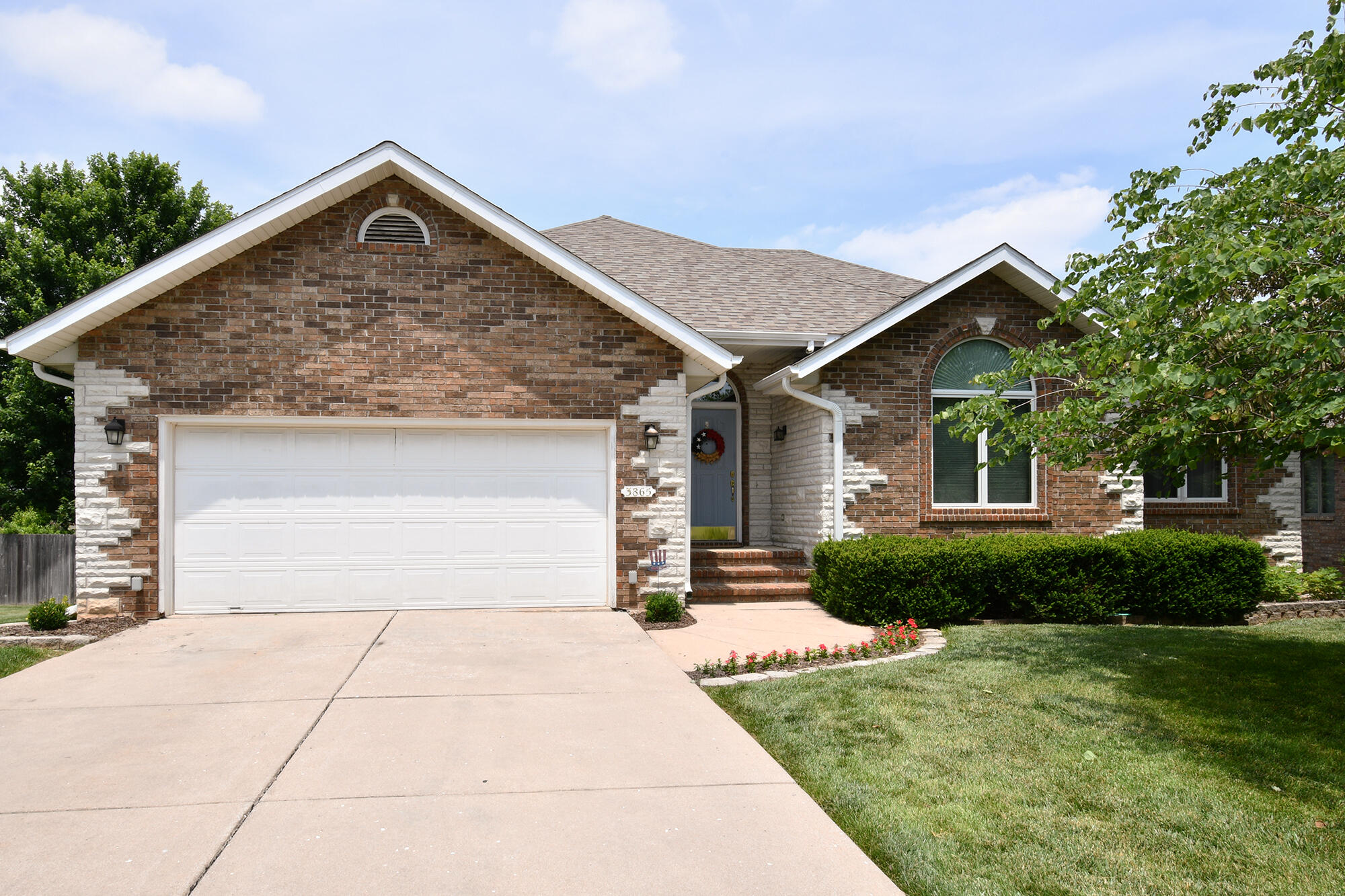 WELL-MAINTAINED 4-BEDROOM HOME IN POPULAR SW NEIGHBORHOOD This incredible 4-bedroom home offers a perfect blend of functionality, space and modern features in the popular Woodland Forrest community. As you step inside, you'll immediately notice the impressive soaring ceilings in the main living area, creating an open and inviting atmosphere. The kitchen is beautifully designed with granite countertops, stainless steel appliances, large kitchen island and ample storage space for all your culinary needs. From the kitchen dining area, step outside onto the covered deck and take in the lush yard, which spans an impressive .34 acres with irrigation system. Whether you're entertaining guests or simply relaxing outdoors, the expansive deck and fenced yard provide plenty of room for 2-legged and 4-legged loved ones. The basement of this home is a true gem, boasting a wet bar, a large living area and a dedicated space for playing games. It's the perfect spot for enjoying quality time with family and friends. Additionally, there are 2 bedrooms downstairs, one of which is nonconforming, offering flexibility for office, exercise or hobby needs. Convenience is key in this home as it features laundry hookups on both the upper and lower levels. Currently, the upstairs laundry area is being used for pantry storage, providing additional space to organize your essentials alongside other pantry storage areas. This home comes with some fantastic extras. All mounted TVs and the Nest smart home system remain in the home. The basement refrigerator and microwave are also included with the property. The 4066-sq.-ft. home features important updates, including an HVAC upgrade in 2019, a new hot water heater installed in 2020, and roof and guttering renovations in 2019. From the soaring ceilings and well-appointed kitchen to the walkout basement and abundance of storage options, this home is sure to impress. Don't miss the opportunity to create lasting memories in this wonderful property