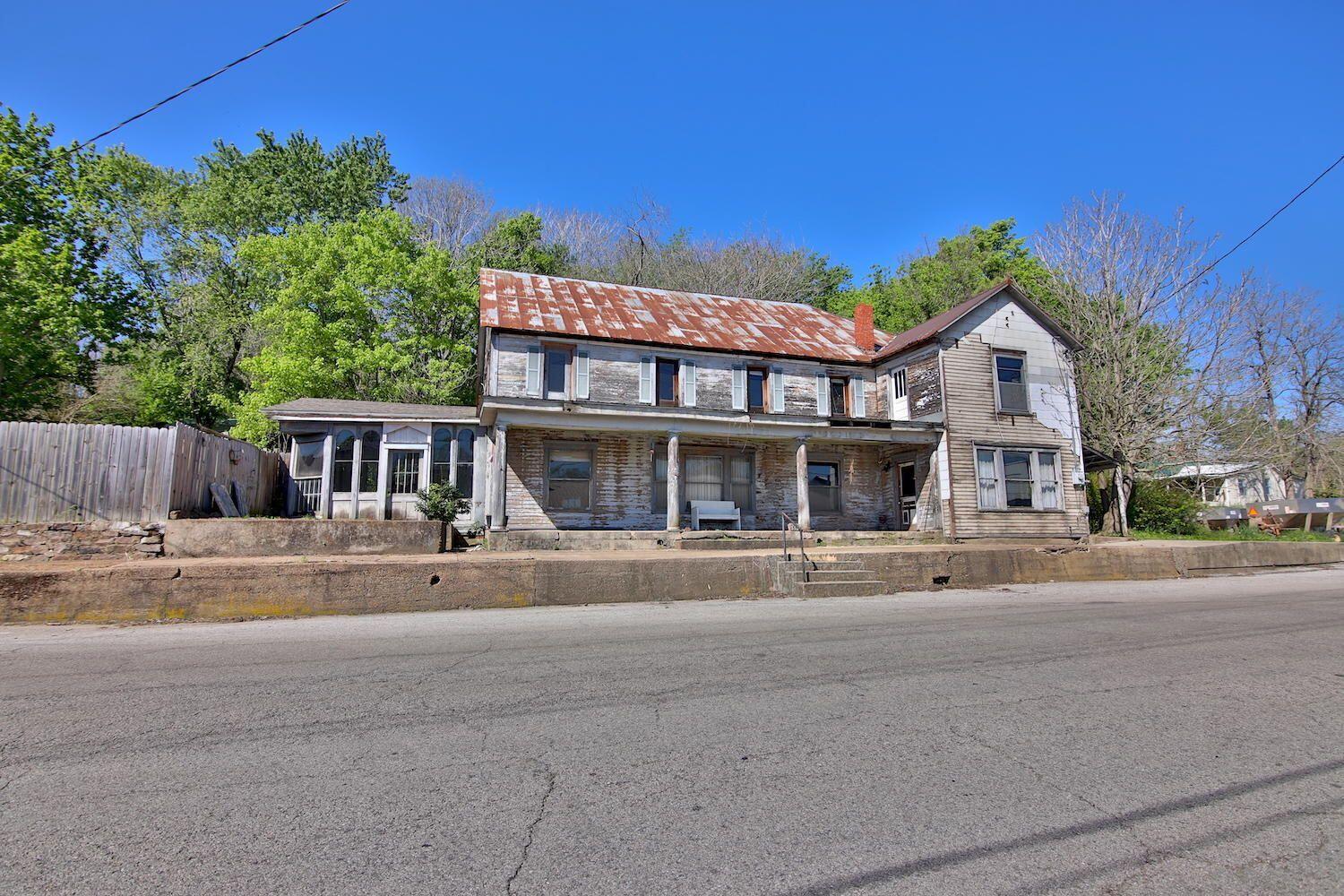 Own an original piece of Thayer, MO! This old hotel is full of history. The last business used it as retail space, but because of its good location you could use it for any business you want. Building itself needs some important repairs before use is recommended. Call today to set up a showing.