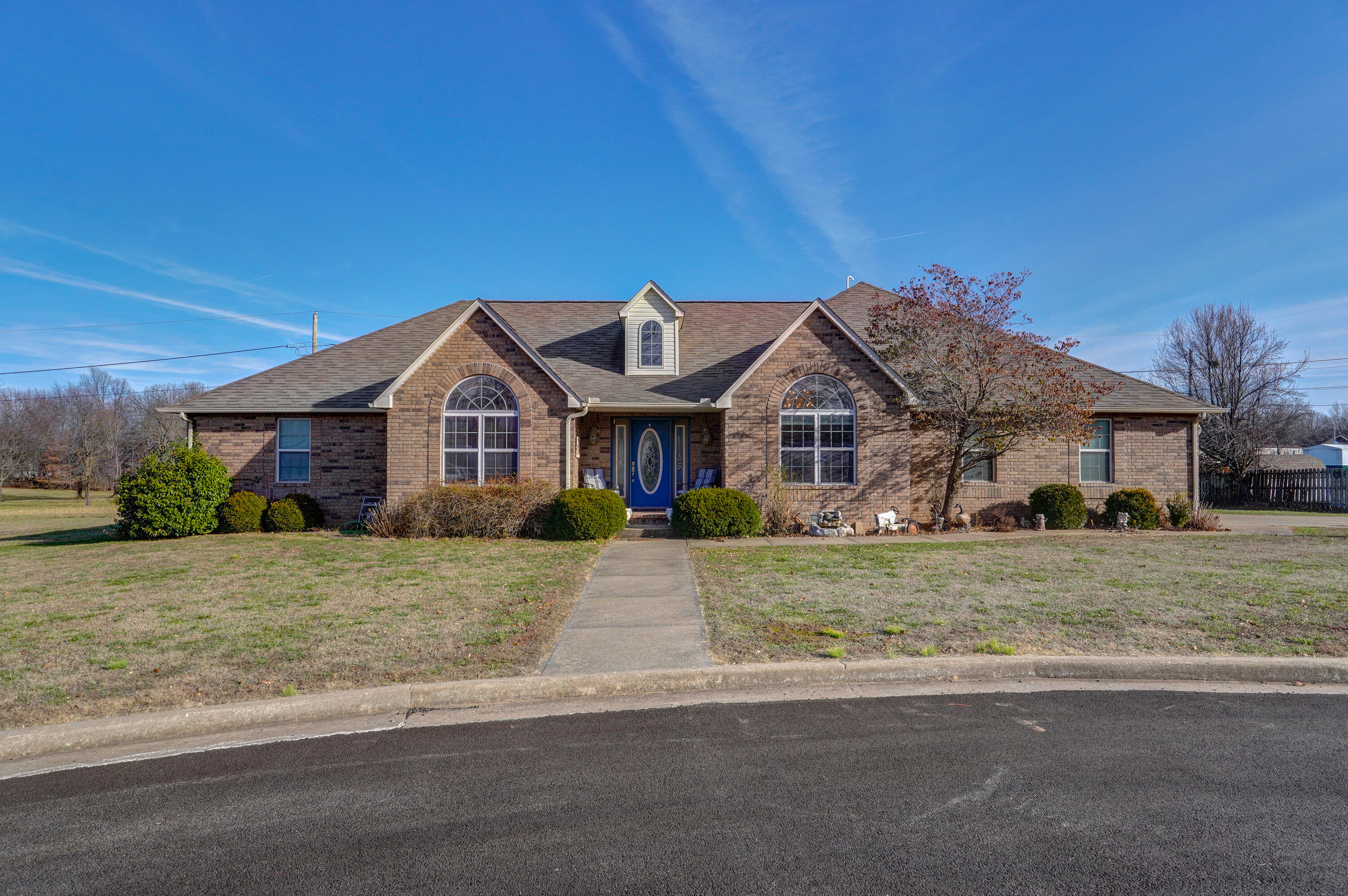 Does sitting on the deck or inside a heated sunroom watching the geese fly to the private neighborhood lake sound appealing? How about walking down to do some fishing? Does having no neighbors behind you sound good along with being at the end of a cul-de-sac? If yes to any of these questions, then this is the house for you!  Beautifully done all brick home in a sought out neighborhood with tons of space. All new carpet and flooring. This home offers large rooms and an open floor plan with 3 large bedrooms, all with nice large closets, including his and her walk ins off master bath. .You can walk out to heated sun room from master, the kitchen or outdoors. There is an office up front that could be a 4th bedroom if desired. Walking into this home shows the care it has had being lightly lived in along with a warm, cozy feeling and color pallette. There is an extra office nook off the family room. Just so many amazing qualities of this home it is a must see in an exquisite location!