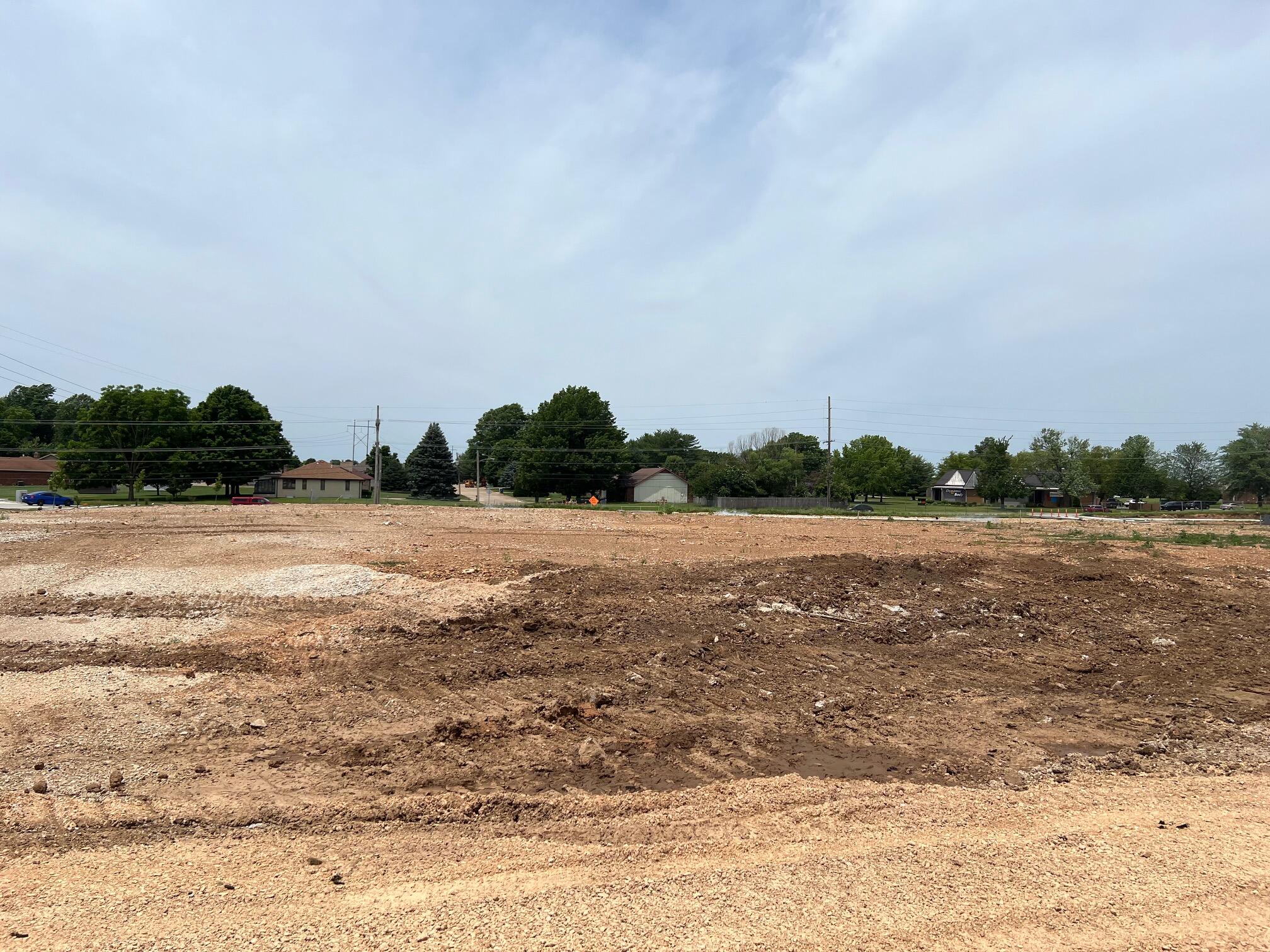 Land has City Sewer, Gas, water and Springnet internet capacity. Lot has storm detention, and the PUD is approved for 3-4 story building approximately 7000 per level.