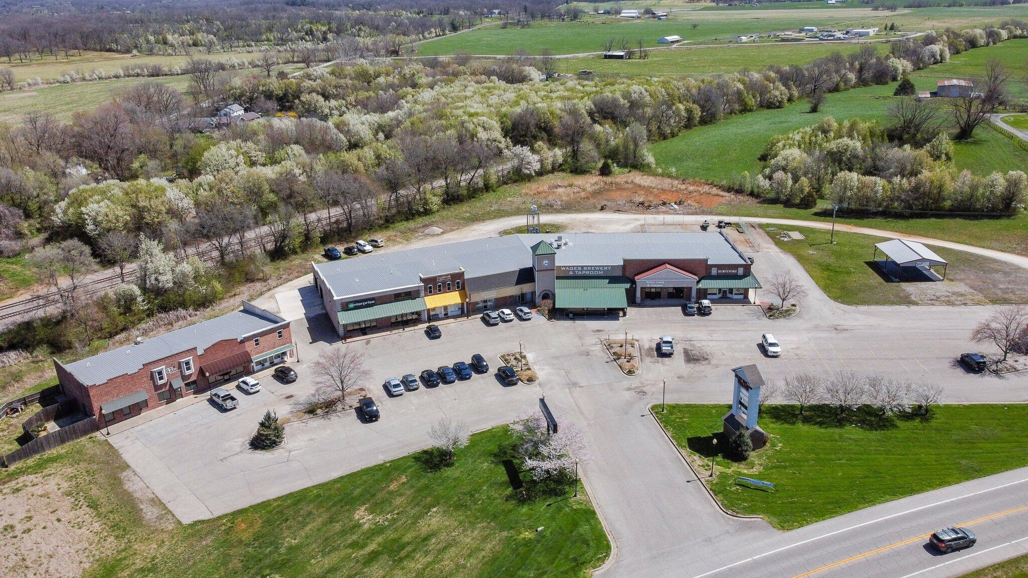 Income Producing Investment Property.  This 28,197 square foot retail space currently 82% leased with gross revenues of $146,529.56.  There is 6,200 square feet with opportunity to rent and increase revenue.  This space has primarily been used for group owners or not for profit groups.... So there is definitely room to increase revenue!East Town Village is conveniently located on the south side of West Plains at the intersection of Highway 63 and Bill Virdon. This intersection is highly used, as it is a common route to Wal-Mart from town and into the Busy Downtown Area.  The City of West Plains  is a growing area with strong economics and steady growth.  Our hospital Ozarks Health Care just finished a $70 Million Dollar Expansion.  We have a branch of Missouri State University and Several Manufacturing Plants.  There is a need for retail/office space in West Plains.West Plains is the shopping and entertainment hub of Howell County (with a population of 40,000+) and several surrounding counties! We offer a large Farmer's Market every Wednesday and Saturday morning and there are many specialized and boutique stores that offer anything from fresh meat to old-fashioned candy. There are plenty of restaurants to enjoy a relaxing meal, such as Colton's Steakhouse or Kiko's Hibachi and Sushi.  Alternatively, if entertainment is what you are after, the West Plains Civic Center plays host to concerts and activities along with local Small Stage Theatres that hosts multiple plays and musicals each year.This property is in the Heart of the Ozarks putting you in the middle of some of the most breathtaking scenery you will ever find. It is a short distance to the pristine Bull Shoals and Norfork Lakes or several great rivers like the North Fork of the White River, the Little Piney, Jack's Fork, and the Eleven Point. And don't forget Mark Twain National Forest, Taum Sauk and Grand Gulf Parks to name a few.  Beautiful places to visit with family or friends.