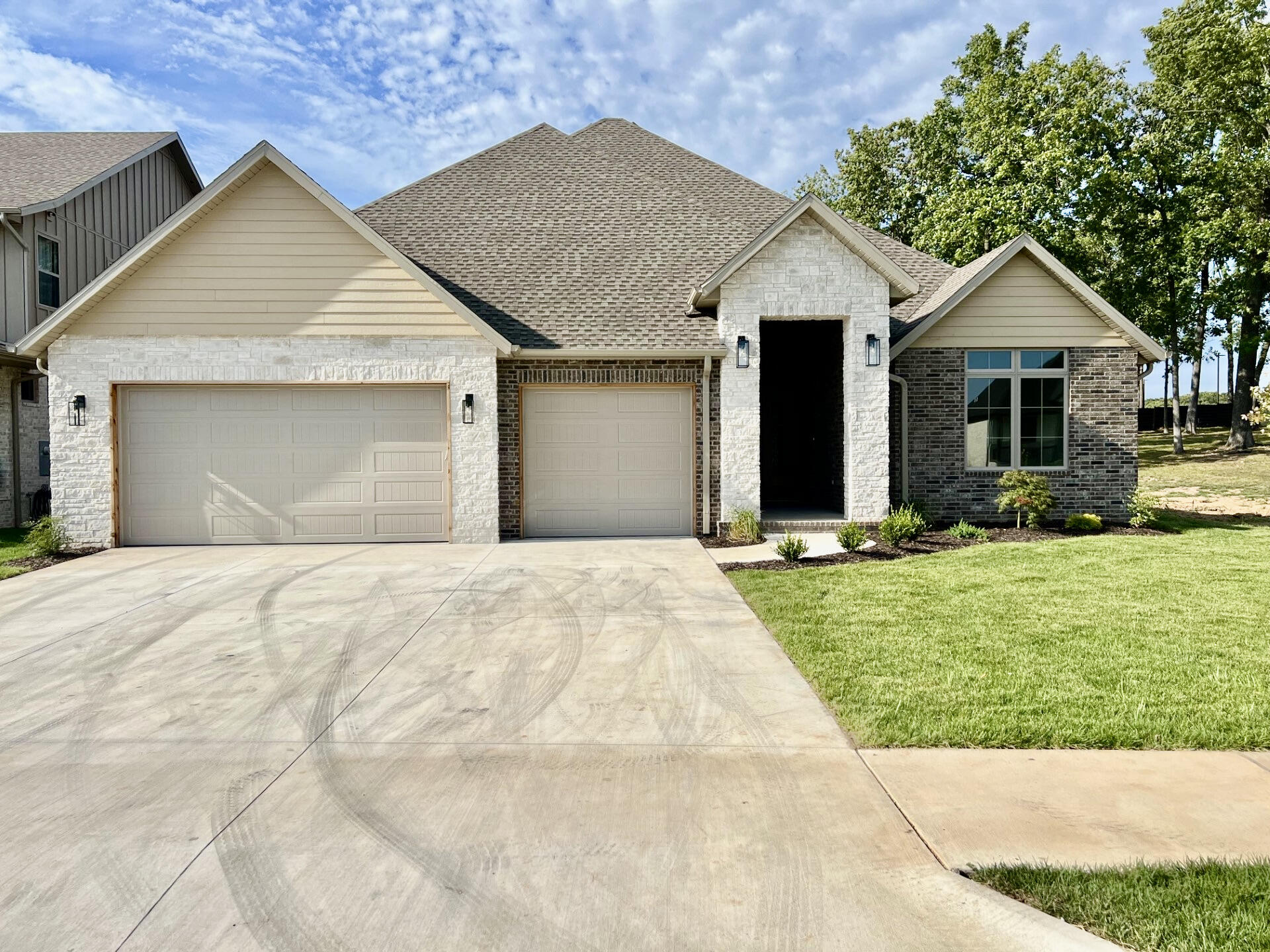 You will love this beautiful setting at Anthony Park. A new premier community in the medical mile. This exceptional New Construction home is completed and move in ready featuring 4 bedrooms, 2.5 baths, All brick and stone with accent siding.  Impressive Open floor plan, tall ceilings, quartz counters, designer lighting through out, two-tone Kitchen with stunning custom cabinetry, hardwood flooring, covered concrete patio in back, and many more amazing finishes through-out!  Great location close to shopping, entertainment and more. A must see! Don't miss this one!