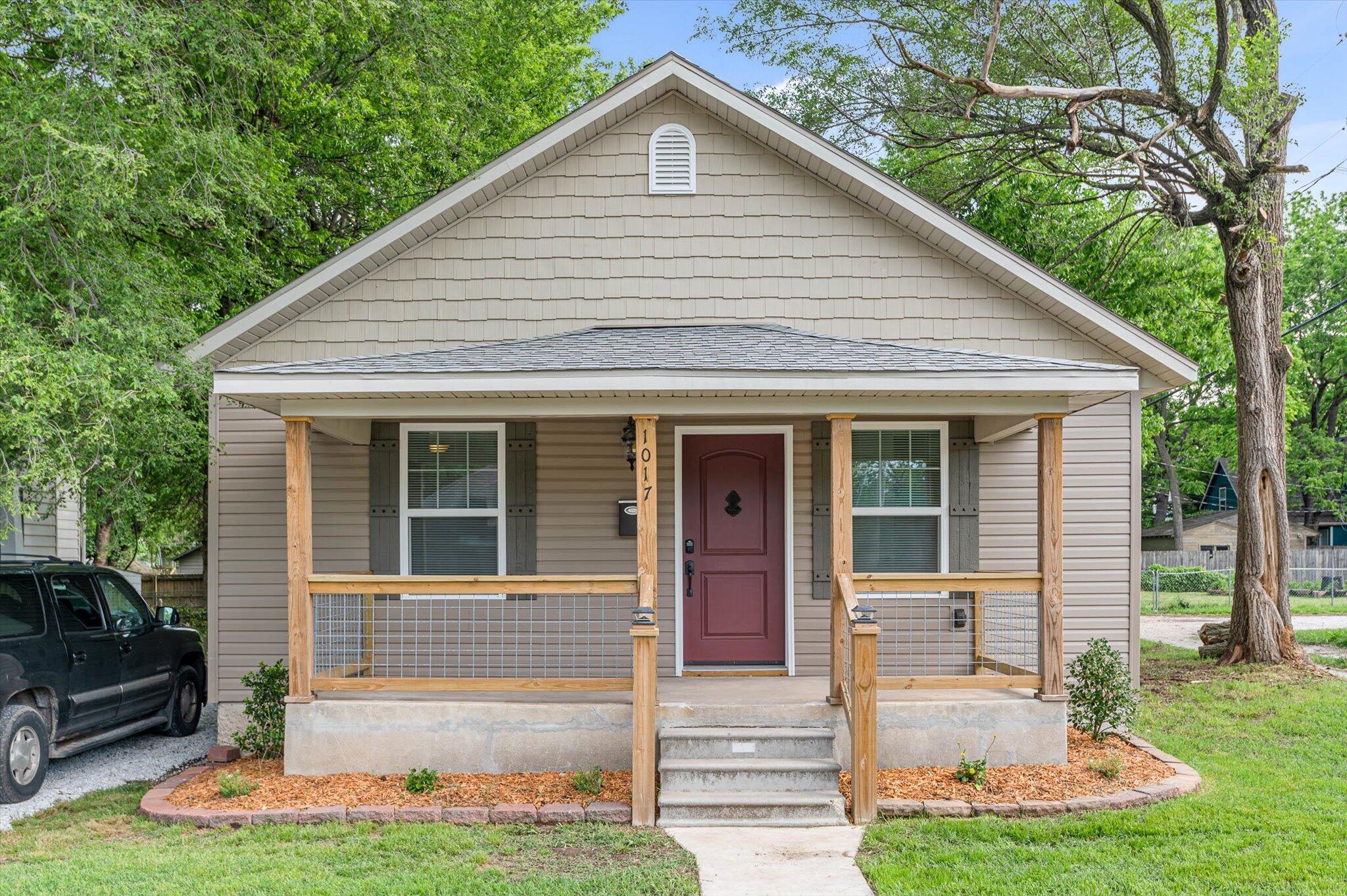 Super sharp, totally remodeled 3 bedroom, 2 bath home with character.   You won't be disappointed with every attention to detail given with in this stunning home with 9' ceilings, radius rounded sheetrock corners, gorgeous kitchen with cathedral ceilings new cabinets with crown moldings, LED can lights, undercabinet lighting accenting the beautiful granite countertops and travertine tile back splash and tile floors.  New wiring, new plumbing, new heat/air, new insulation, new windows, vinyl flooring and much more.  Covered porch and spacious deck overlooking mostly finished yard.
