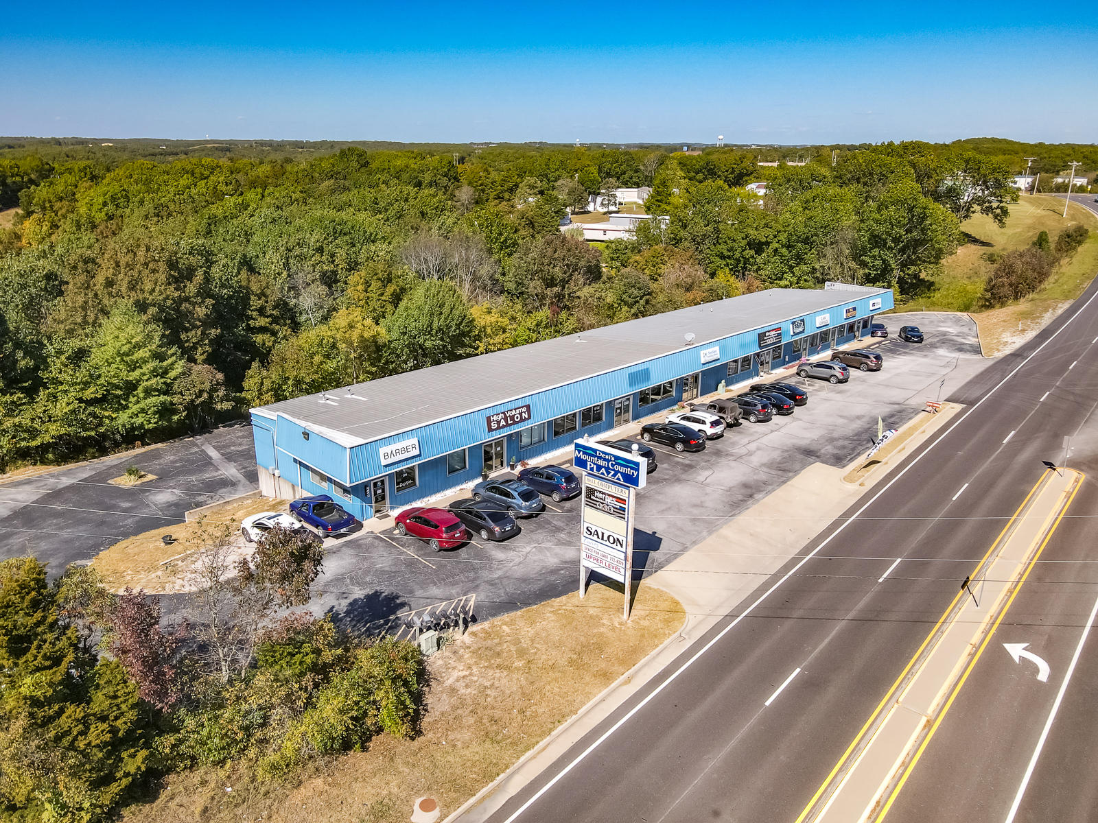 Opportunity is knocking at Mountain Country Plaza in Branson West! 8,800 sq. ft strip mall with an awesome track record. 8,800 sq. ft in lower level is completely vacant and ready to remodel/rent out as offices or efficiency apartments (currently being used as storage). Main level office spaces are: Sullivan Law Office (23 year+ tenant)  Farm Bureau (17 year+ tenant) Tantique (12 year+ tenant) Unit 7 Open Main Level All 7 lower level units are open (when storage items are removed) and ready to rent out!