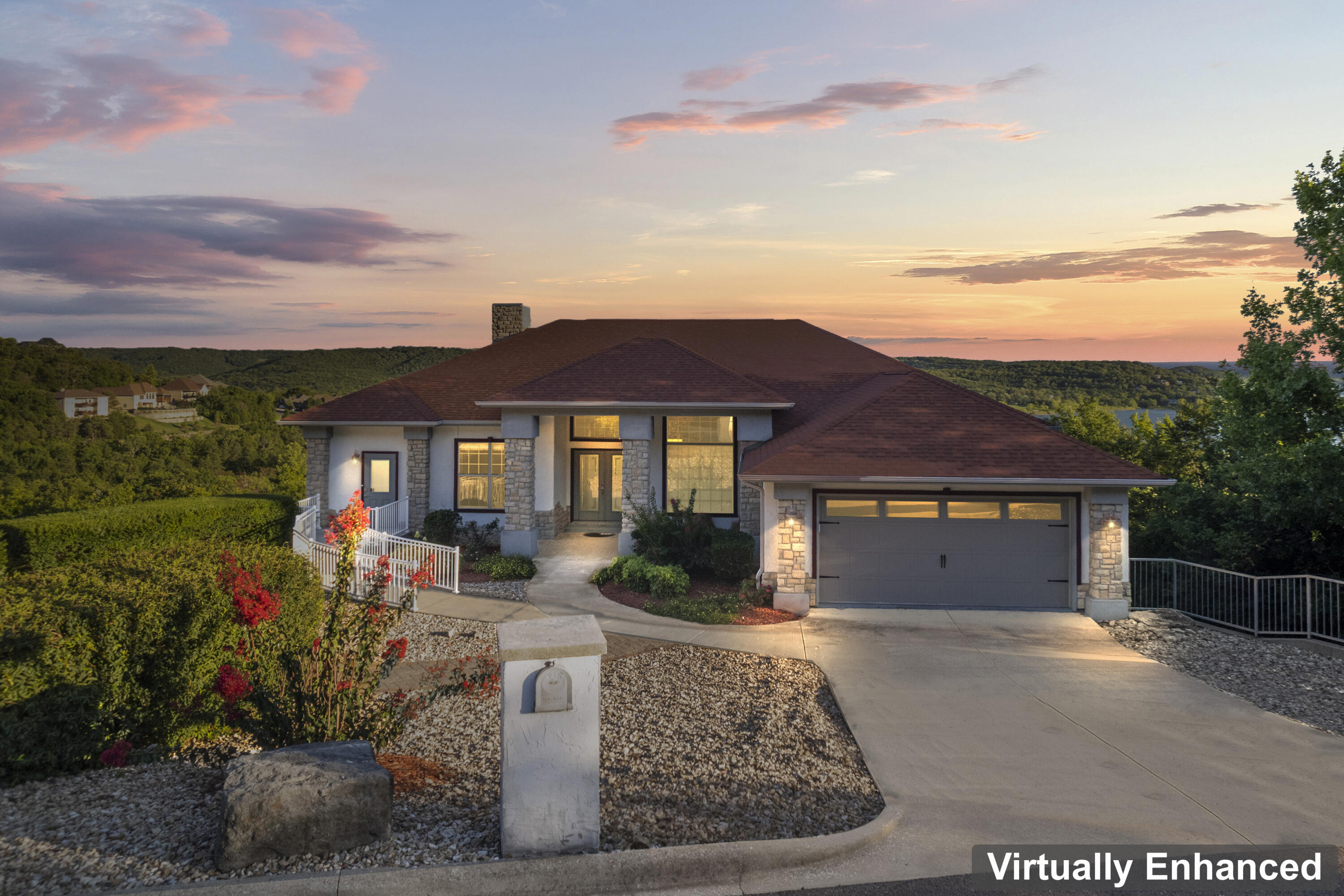This is an amazing opportunity to own and enjoy year-round views of Table Rock Lake and all the extras that come with ''lake life'' including the opportunity to purchase a boat slip when available, a convenient high and dry boat storage (where they store and launch your boat for you )club house, pool, fitness center and tennis court.  This beautiful home is in the prominent gated community of Emerald Pointe and features 6 spacious bedrooms, 3 1/2 bathrooms, and another large room perfect for a theater room.  The basement has a very large main area for whatever your heart desires.  There is generous parking in the two-car garage and the exterior features a large seating area and easy maintenance landscaping that has always been professionally maintained.  Large deck facing the panoramic lake view are easily accessible from many rooms in the home.  The kitchen has beautiful granite countertops and ample storage in hickory cabinets, throughout the entire home.  The roof was new in 2020 and has had a yearly maintenance plan.  New picture windows offer a splendid view and lend brilliant sun light to the inside.  The appliances all stay with the home including top of the line washer (with a small load washer underneath) and dryer.  A water softener and instant hot water from the water heater are an added bonus.  A stair lift, and other handicap features including a ramp to added exterior door, grab bars, and a lift in the bedroom are in the home, but could be removed by new owners.  There is also a spacious unfinished area downstairs containing the mechanical room and ample area for a safe room or wine cellar.  Call today for your private showing!!
