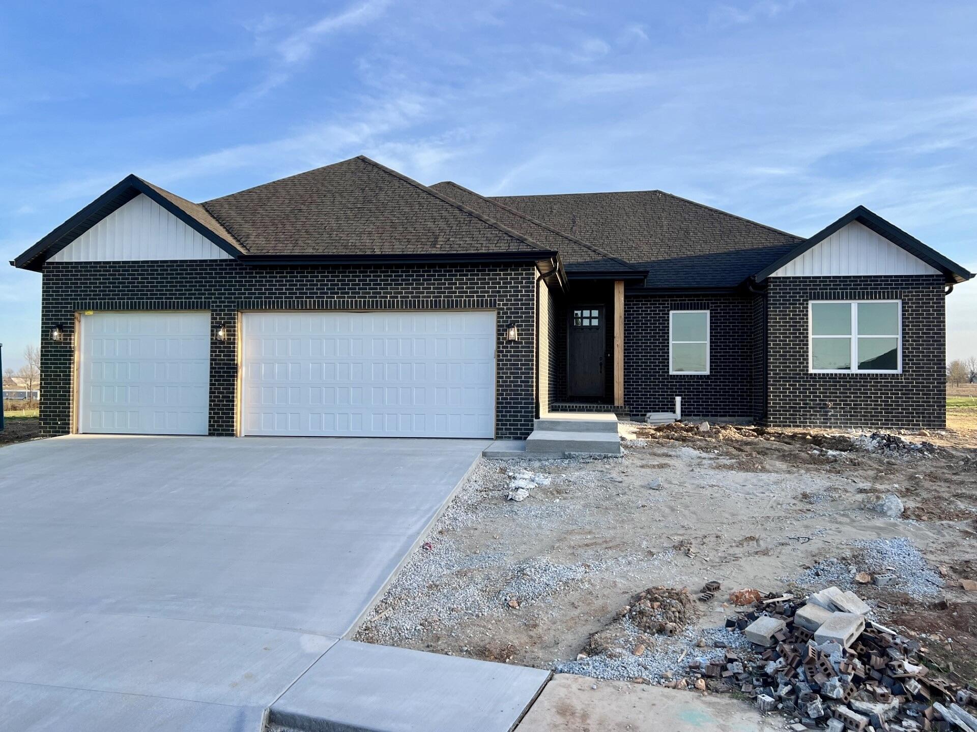 Welcome to Meadowbrooke! A new premier community in the heart of Nixa. This Brand new construction home features 4 bedrooms, 2 full baths, 8 foot entry door, quarts kitchen counters, soaring ceilings, large windows, cozy living room fireplace, stunning custom cabinets and trim throughout, oversized 3 car garage, covered back patio, large walk-in pantry, SS appliances, elegant lighting, and so much more! Come and see for yourself and make this your dream home!
