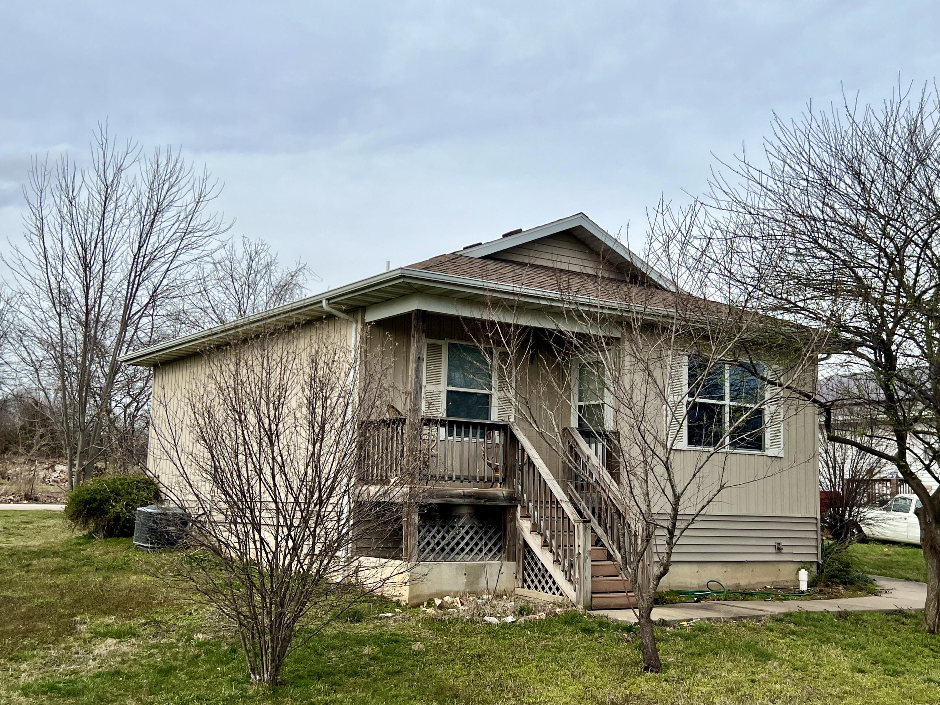Adorable, affordable, stellar location, and well built little cottage which is the last one on the street (corner lot) and allows a little elbow room for fire pit and relaxation. All the big maintenance items have been done! New roof February of 2021 and new water heater this year! It's just outside the city and has an oversized crawlspace that is super clean and has been used for storage in the past. Floorpan makes for not one inch of wasted space and there is a Storage shed too! Tired of apartment living? Check this one out! OWNER OCCUPANTS ONLY>>DEED RESTRICTION! CAN NOT BE A RENTAL!