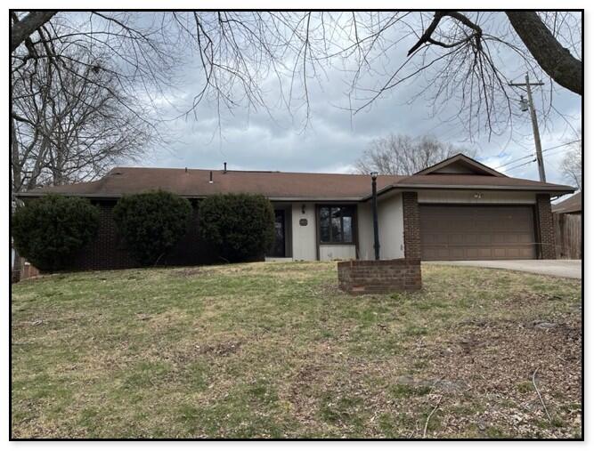 REDUCED $15,000 and ready for a new owner to give this large southwest Springfield ranch style home some love! Wonderful opportunity here in this 3 bedroom, 2 bath home in southwest Springfield! Located west off of Cox Rd, this home is close to schools, shopping and just about everything you need with quick access to James River Freeway. It features 3 bedrooms with an extra large primary bedroom, 2 additional bedrooms, a hallway laundry room, a generously sized kitchen with a living room just off of that with a wood burning fireplace! And just in case you needed more reasons to put this one on your list, it also has a formal dining room and a sunroom!