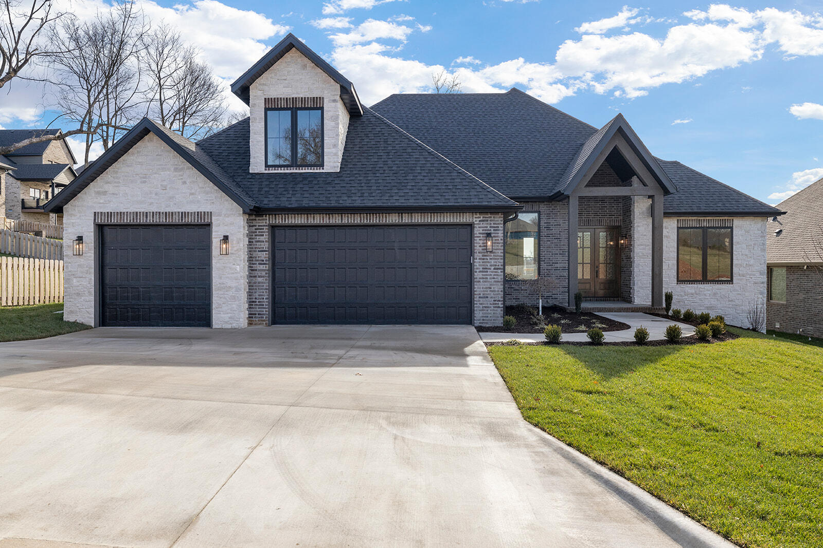 You will love this beautiful setting at Anthony Park. A new premier community in the medical mile. This exceptional New Construction home is completed and move in ready featuring 5 bedrooms, 3.5 baths, bonus room/5th bedroom. All brick and stone, Impressive Open floor plan, tall ceilings, quartz counters, designer lighting through out, two-tone Kitchen with stunning custom cabinetry, hardwood flooring, covered deck, and many more amazing finishes through-out!  Great location close to shopping, entertainment and more. A must see! Don't miss this one!