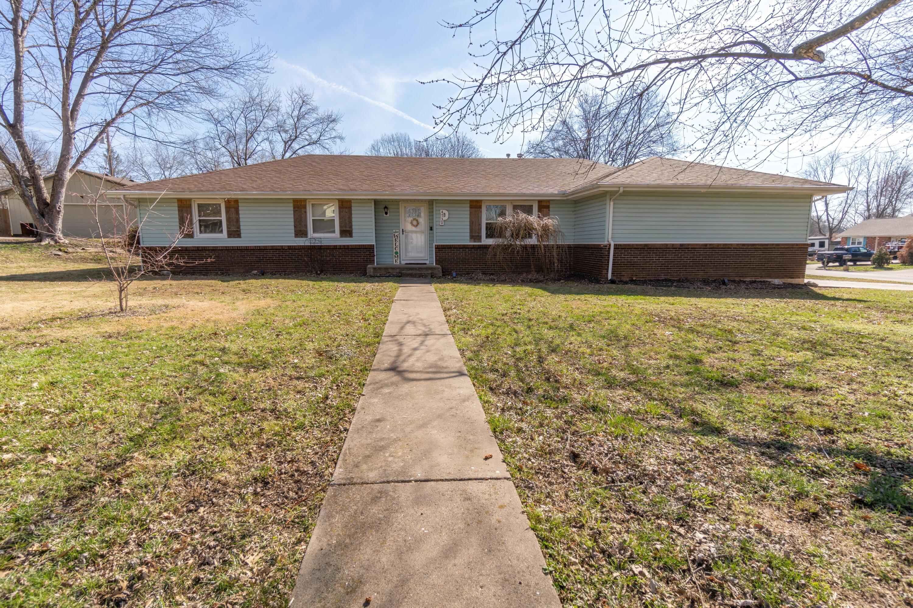 **OPEN HOUSE 3/19 2-4PM** Check out this great home in Southwest Springfield! Cherokee and Kickapoo Schools. This open floor plan, single story, ranch style home is completely updated with granite counter tops and soft close cabinets. The 3 bedroom, 2 1/2 bath home is sure to impress. There is extra living space along with a dining area and a walk-in tiled shower in the master bath. The two car garage has a walk up entry accessible ramp. No carpet, no stairs, and same vinyl plank flooring throughout. Relax under the covered back patio in the shade. The home sits on a bigger .39 acre fenced lot with a shed in the backyard. Updated with an all new electrical panel less than a year ago and the Sellers have a transferable Home Warranty until January 25th 2024. Don't wait, you don't want to miss out on this wonderful home in a quiet neighborhood!