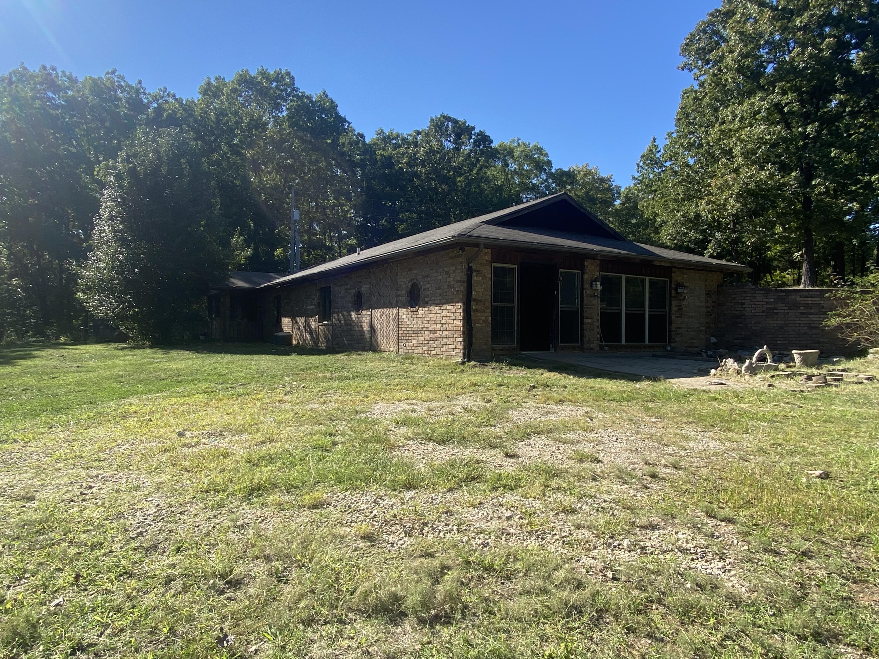 Investment or flip opportunity! Home sits on a secluded, wooded 3.75 acres! Beautiful property! Home has been cleared out and is ready to be remodeled. Large detached garage and shed sits behind home. Come check it out today!