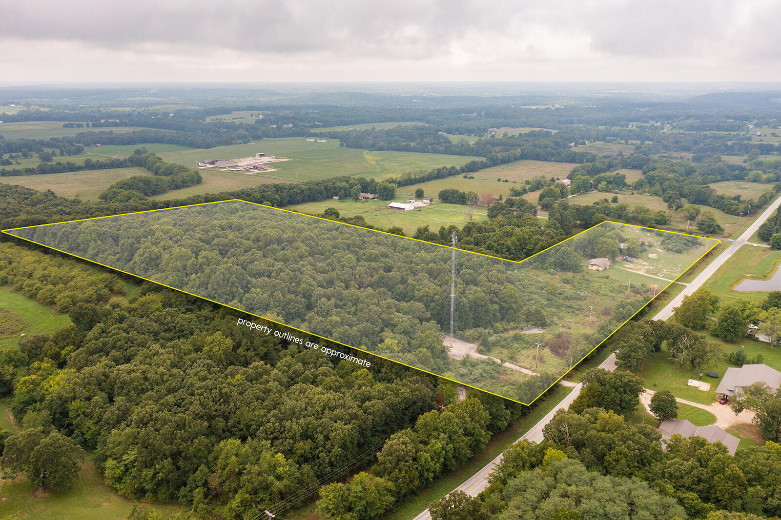 Whether you're looking to build your dream home or use it for farming, this 23.86 acres is just what you need! Located on the corner of State Hwy J and Cologna Road, this land is close to the downtown area of Marshfield and yet it feels so secluded! There is an uninhabited all-brick home on the property that can be fully remodeled or torn down so you can build your forever home! There are so many options with this land! Don't let this gem pass you by!