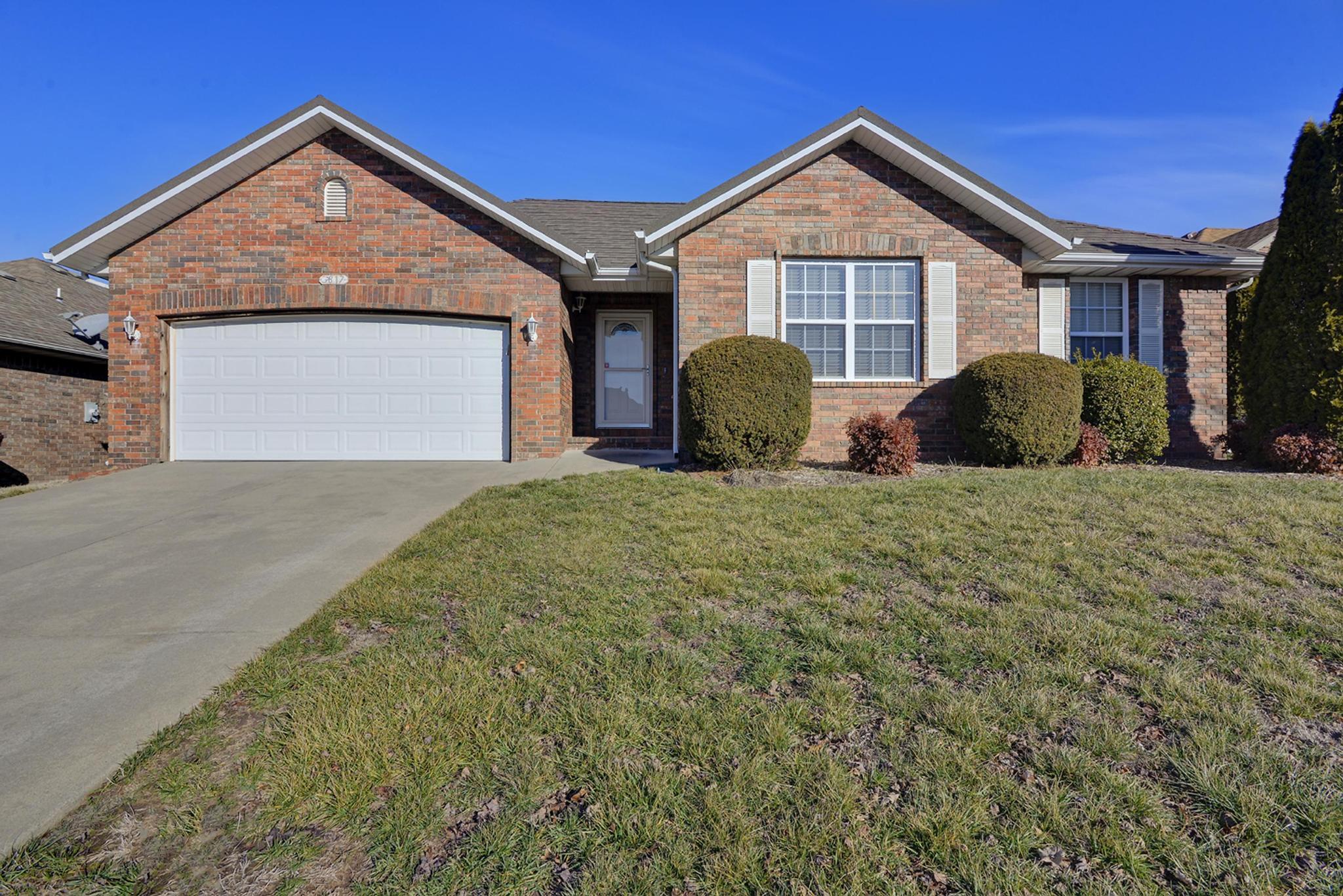 Spacious, all-brick home just steps away from Southcreek Greenway Trail entrance and with a Stone Coated Steel metal roof  from Erie Metal Roofing which was just installed in 2019! The home features a spacious living room with tray ceiling treatment and a wonderful gas fireplace. The large kitchen/dining features beautiful hardwood floors and all appliances stay, including the refrigerator! The full master suite features  an octagonal tray ceiling and a remodeled bath with dual walk-in closets, dual sink vanity, updated vinyl plank flooring, jetted tub and a wonderful, updated, glass-door walk-in shower! Out back you'll find a partially fenced yard and a great covered patio. Don't wait, call today for your private tour! Home Warranty included!