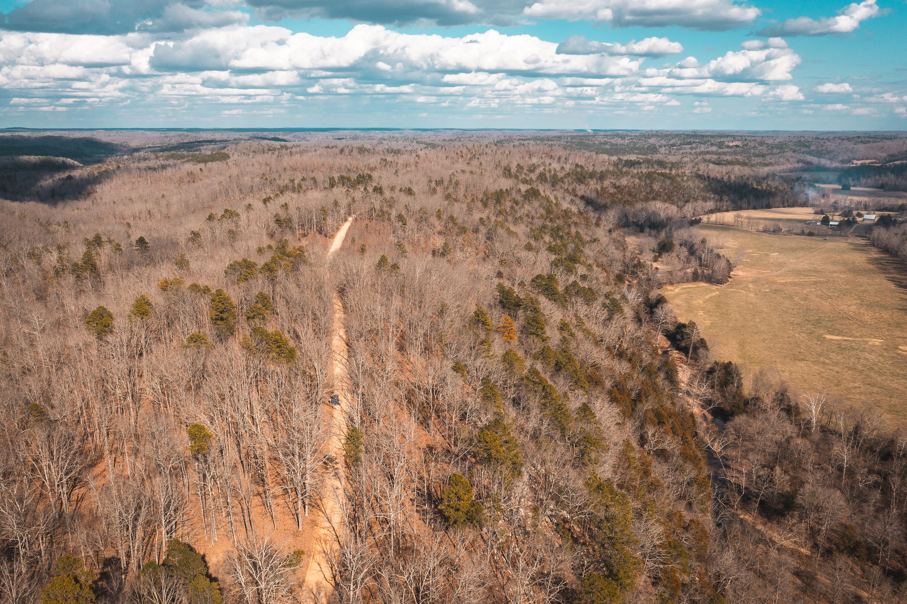 18 m/l acres of some of the Ozark's best views. Located in Texas County, Missouri this acreage offers Ashley Creek frontage and is just off of the gravel road. This property could be used in several different ways. Great build site for the perfect home , a great property for a weekend getaway vacation rental site, or just recreational purposes. Close proximity to the Montauk State Park for excellent trout fishing. Deer and Turkey are frequent sights as Texas county is among the leading counties for whitetail. Maps are for marketing only. All tracts are surveyed and will be recorded prior to closing. Owner is a licensed agent.