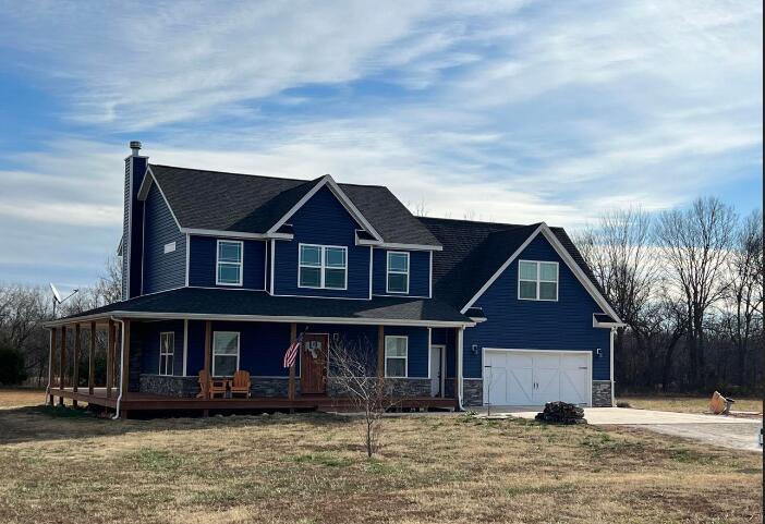Attractive farmhouse style home on 2.69 acres and relaxing wrap around porch. Wood-burning fireplace insert, mudroom and huge bonus room.