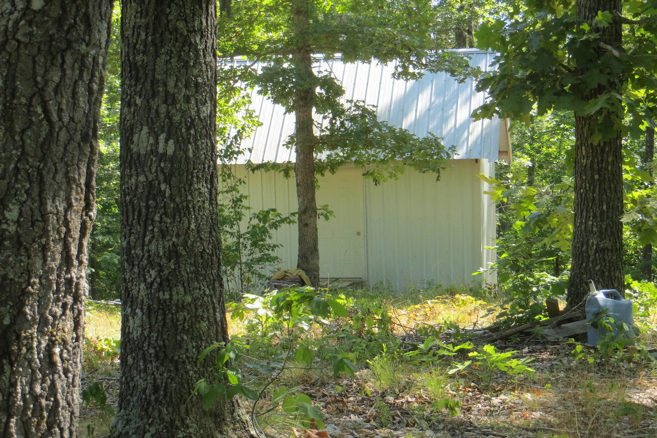 ACREAGE/CABIN/RECREATIONAL...Prime getaway on 8 acres with a 1-room cabin 12x16 ideal for camping and enjoying the land. There is a good stand of various oak trees, some hickory. Good hunting area, adjoins larger acreage. Near the end of the road location, more than likely if anyone comes down the road they are coming to see you, there is one other property past the 8 acres. Around 1 acres open to semi-open would be a good place for food plots, or establish a garden area. A variety of terrains, level, gentle slope and steep slopes.  Spring River access is nearby for fishing and boating. It's only #39,500.