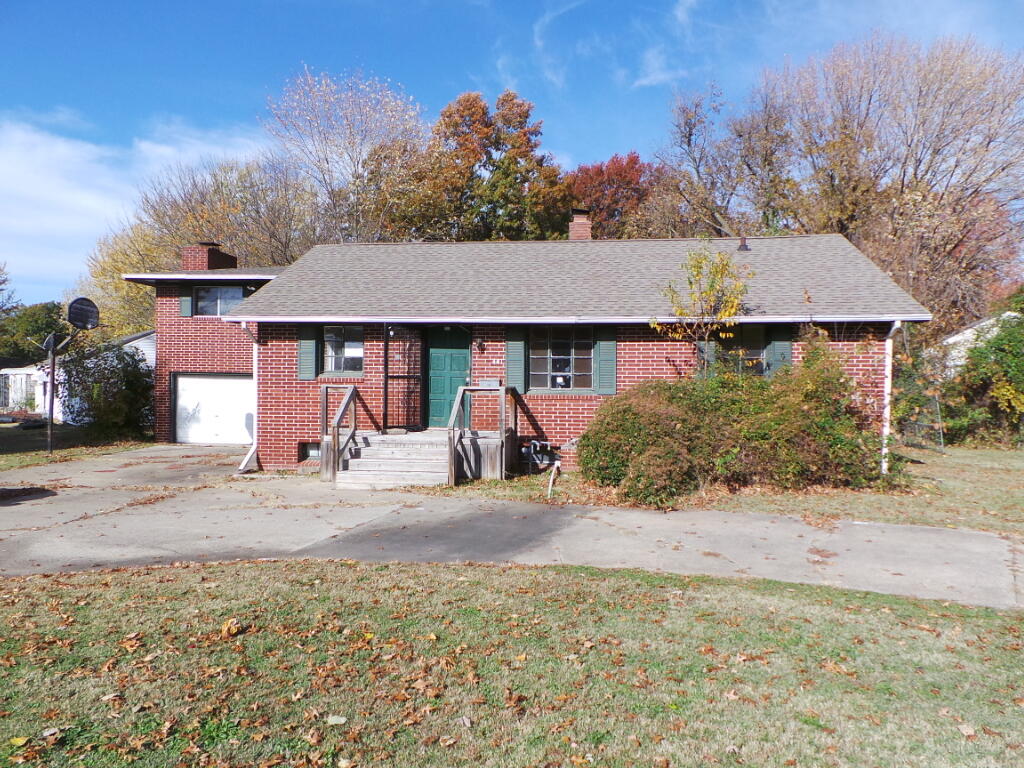 LESS THAN $35 A SQFT!!!!! You read that right! Come see this full brick 1.5 story home offering 3 bedrooms 2 full baths over 1650 Sq.ft. an unfinished basement, two living areas, fireplace in the family room, attached garage all conveniently located close to the University!! Hurry before its too late!