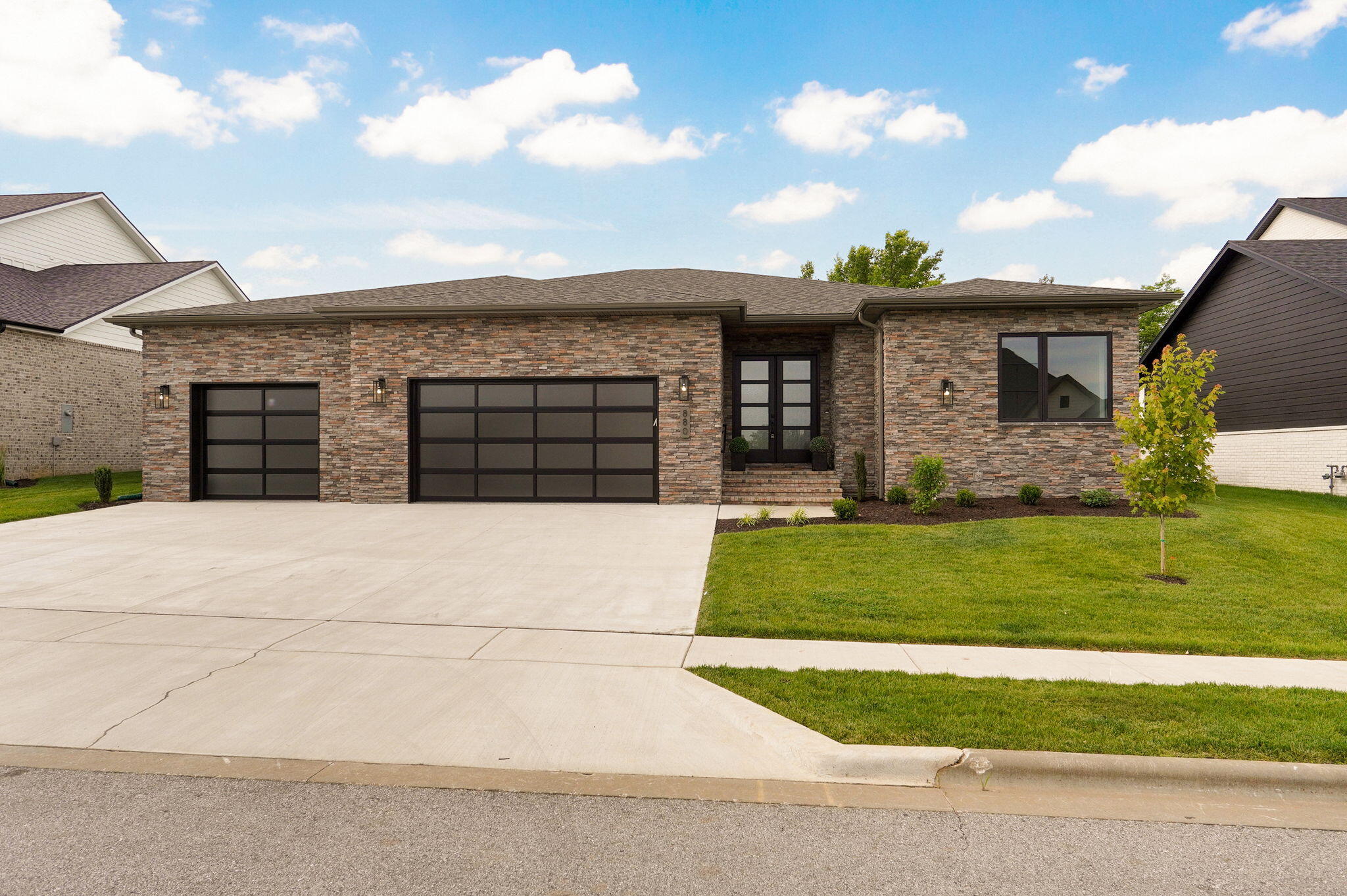 Welcome to this brand-new construction, a stunning 4-bedroom, 3-bathroom home located in the sought-after Nixa, MO neighborhood. This home is a perfect blend of modern luxury with features such as gorgeous quartz countertops, GE refrigerator, and a spacious walk-in pantry, offering both style and practicality.  You will be wowed with the large windows that bring life, light, and an airy feel all throughout the home! Entertain in style with a bar area and surround sound throughout the home, creating the perfect atmosphere for gatherings and celebrations. The oversized, epoxy garage floor garage provides ample space for your vehicles and storage needs, ensuring you have room for everything. Unwind in the beautiful master suite, which includes a spacious bedroom and a spa-like bathroom with a curb-less entry tile shower, offering a true retreat within your own home. This home also features a beautiful kitchen add on kitchenette with a prep sink, mini fridge, and perfect spot for a coffee bar! Walk into a beautiful laundry area with sink, overhead cabinet space, and spots for laundry baskets! And step out finally to your fully sodded and irrigated backyard that features a full fence already installed, as well as trees ready to grow and continue to give you more privacy! Nestled in the heart of Nixa, MO, you'll enjoy the benefits of top-rated schools, local parks, and easy access to shopping and dining.