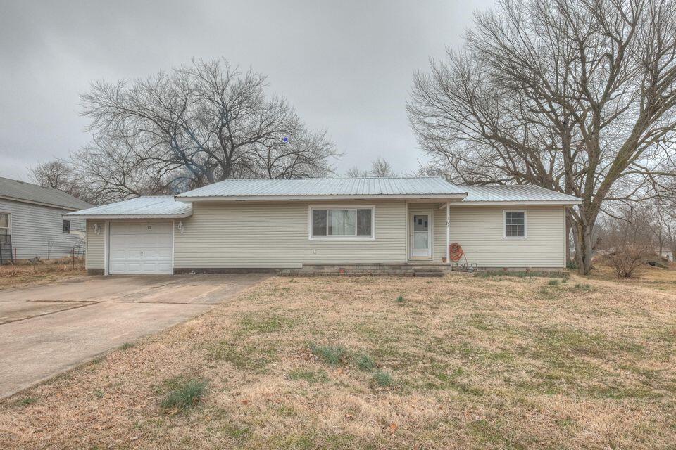 6 miles from Webb City in Webb City school distract on corner lot. 3 bed 2 bath, 1 level on .53 acres w/ a couple buildings out back. Updated flooring in bedroom, living room and kitchen. Won't last long! Call and make your appointment today!